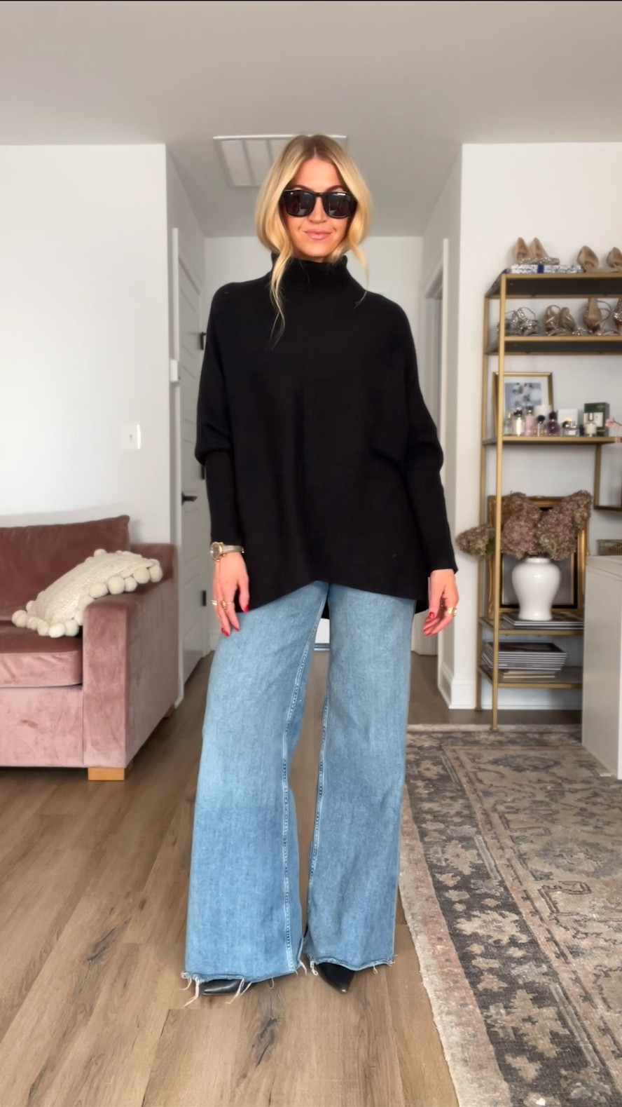 Black sweater (wearing a M) + high rise wide leg jeans 

#LTKstyletip #LTKVideo #LTKSeasonal