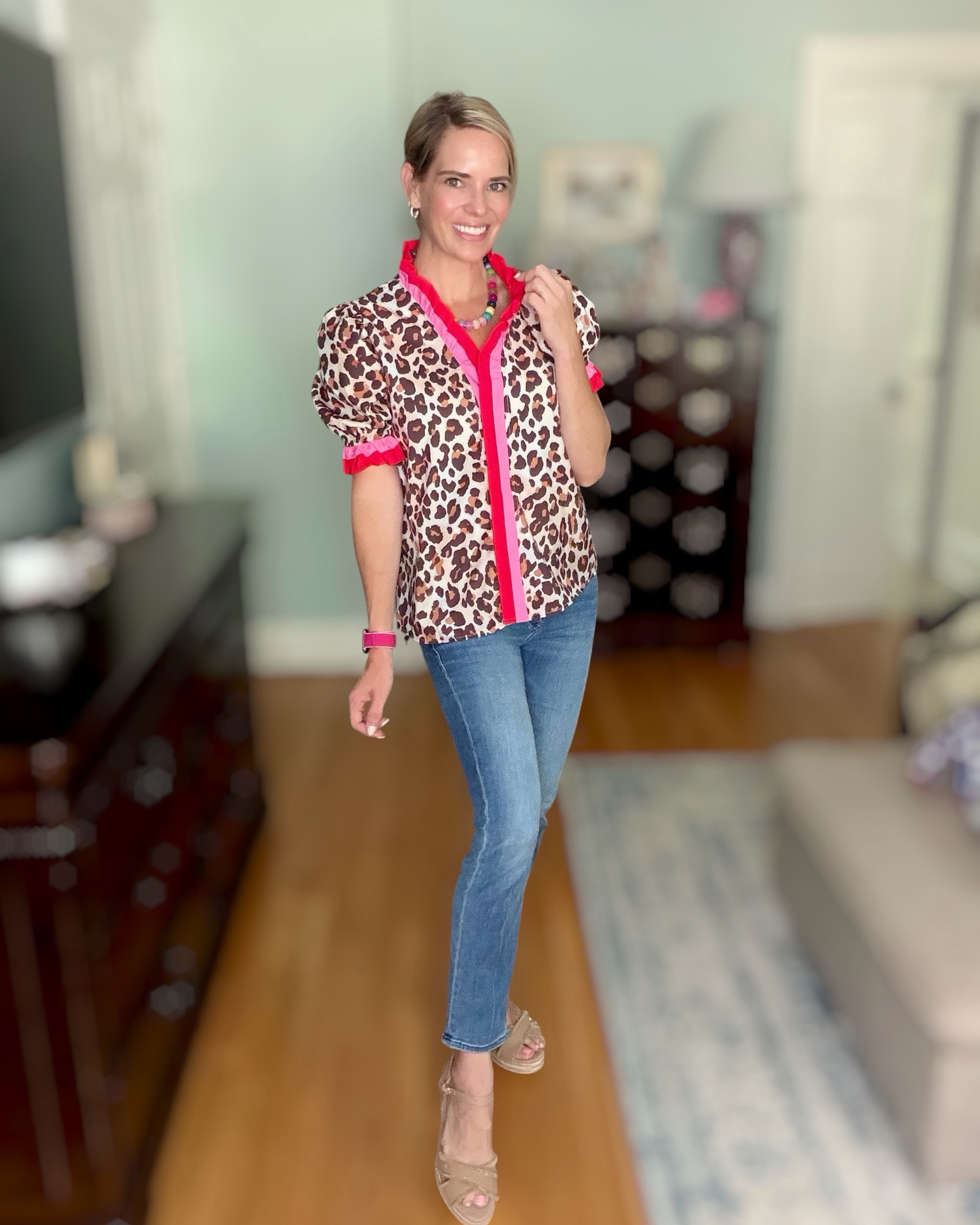 Leopard Blouse with Pink Trim 🐆💕

This leopard print blouse is such a fun statement piece! The bold pink trim and ruffle details give it the perfect pop of color while the puff sleeves add a polished, feminine touch. It’s lightweight, comfortable, and an easy way to dress up your favorite pair of jeans.

I styled it with petite straight-leg denim, neutral platform wedges, colorful beaded jewelry, and classic hoops for a look that’s perfect for lunch with friends, date night, the office, or a casual weekend out. If you love mixing classic prints with bright accents, this top is such a fun addition to your wardrobe!

leopard print blouse, pink trim top, puff sleeve blouse, Amazon fashion finds, casual chic outfit, women’s fall fashion, transitional outfit, statement top, straight leg jeans, neutral wedges, colorful accessories, affordable fashion, elevated everyday style, date night outfit, workwear inspiration, boutique style on a budget 🩷🐆

#LTKOver40 #LTKPetite #LTKootd
