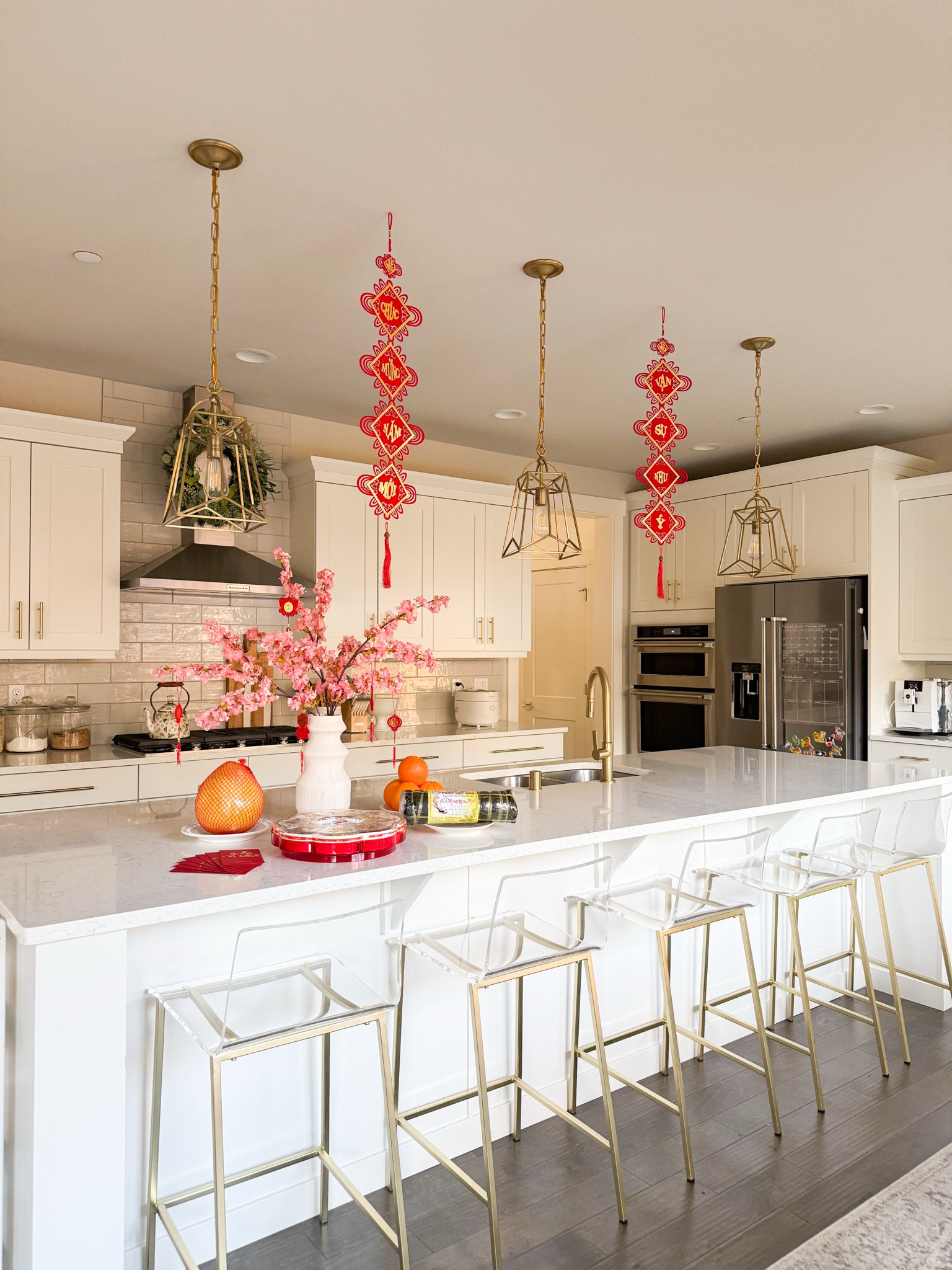 Lunar New Year decor with red paper lanterns! Kitchen decor 

Chinese lunar new year, Vietnamese Lunar New Year Decorations 2025, Tết, Artificial Flowers, Hanging Ornaments, Chinese Red Lanterns Oriental Hanging Lucky Paper Fans, red envelopes, rug, vase, cabinet credenza, double sided tape, command clips, home decor, frame, year of the horse 

#LTKSeasonal #LTKHome