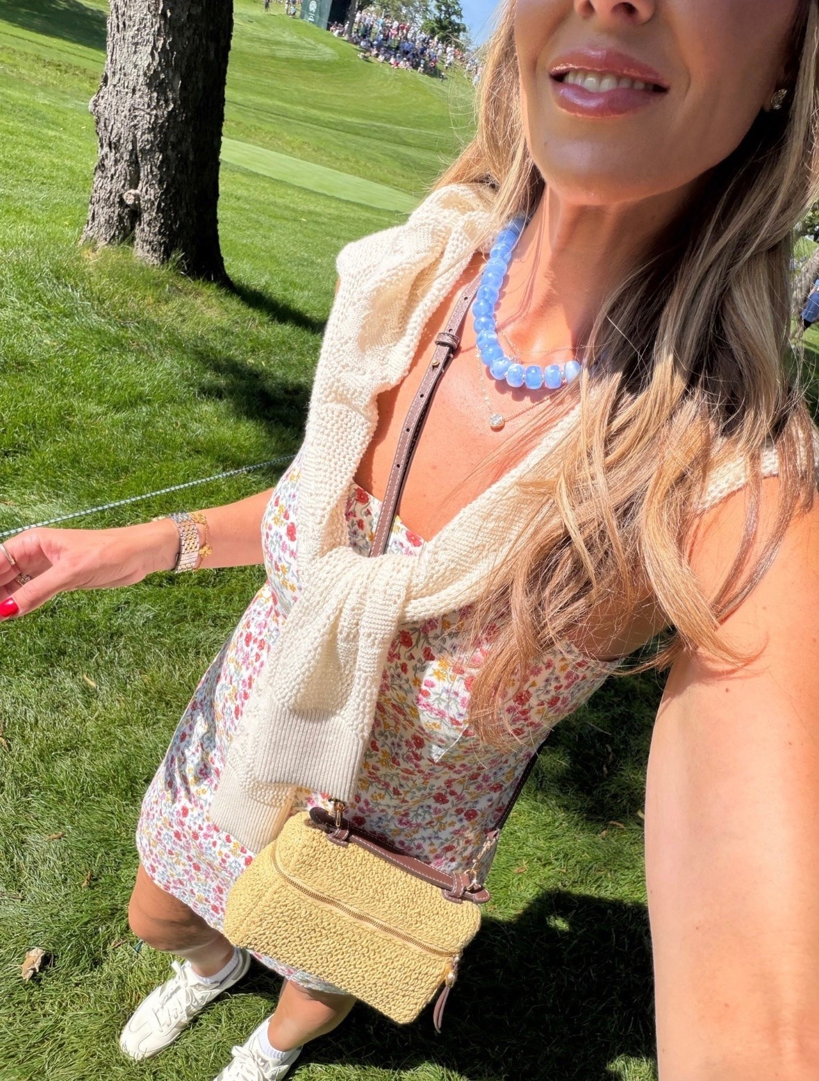 This floral mini dress is such a cute summer find. The delicate print, lightweight fabric, and sweater-over-the-shoulders styling give it that effortless country club feel. Perfect for golf tournaments, weekend brunch, vacation days, or any sunny summer outing.

Floral mini dress, Summer outfit, Golf tournament outfit, Country club style, Floral dress, Casual chic, Vacation outfit, Weekend style, Preppy fashion, Summer fashion, Sneakers outfit, Everyday style, TheMomInStyle

#LTKTravel #LTKSeasonal #LTKOver40