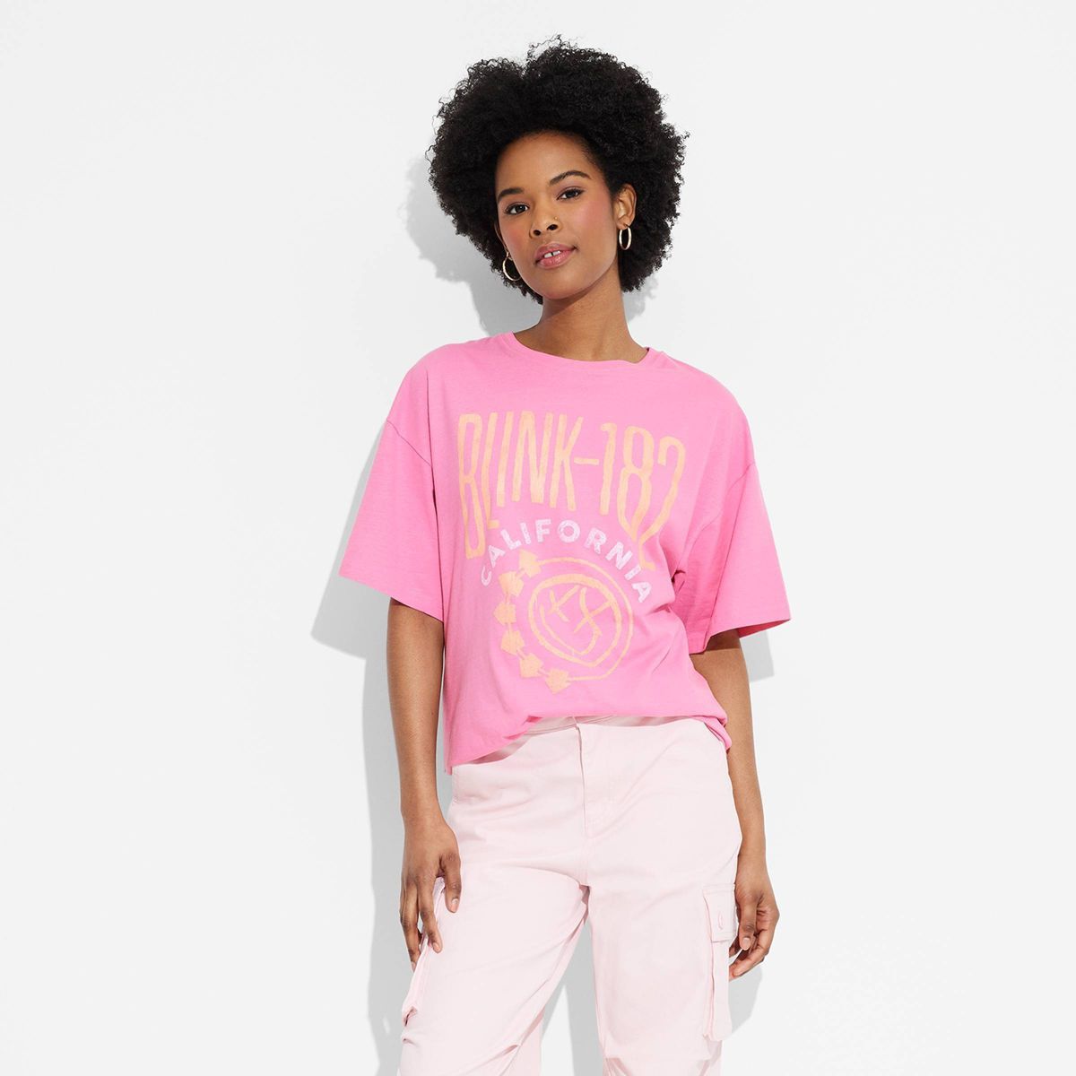 Women's Blink 182 Oversized Short Sleeve Graphic T-Shirt - Pink L | Target