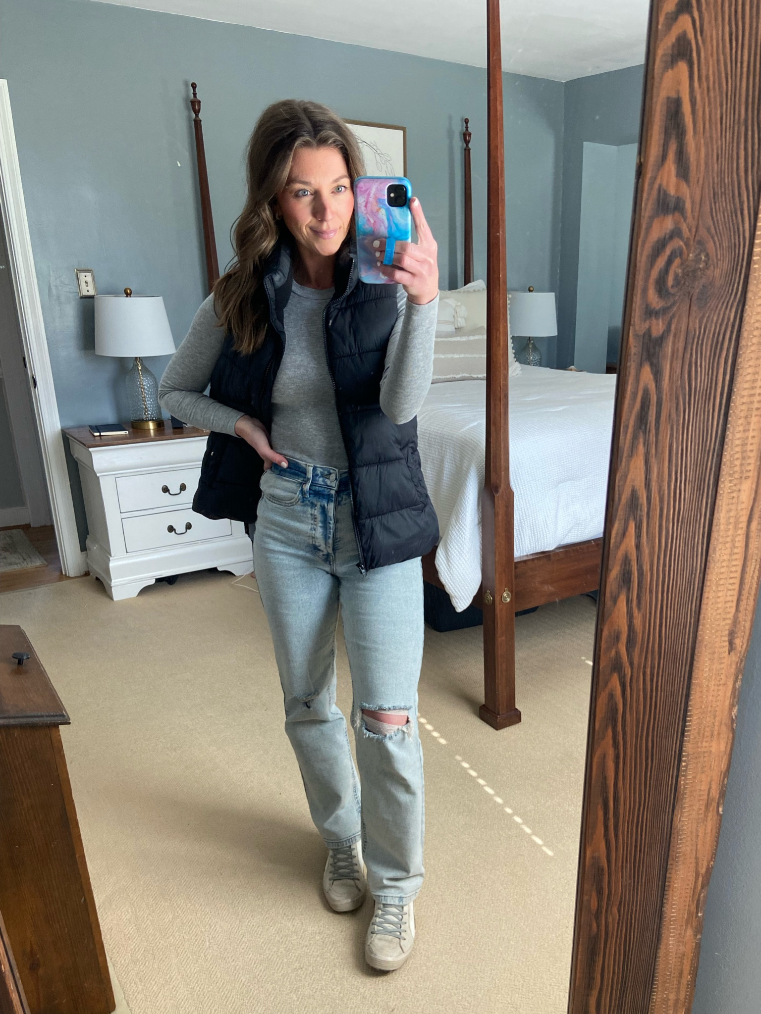 Outfit details today.
Love these jeans!!! High waisted and straight loose leg. I go between 2 sizes and went with the smaller size. They fit great! My vest is old but linked some similar ones.