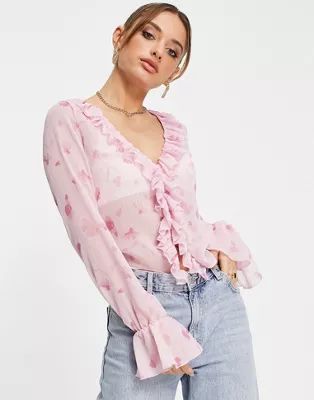 ASOS DESIGN frill neck volume sleeve top with button front in pink floral | ASOS (Global)