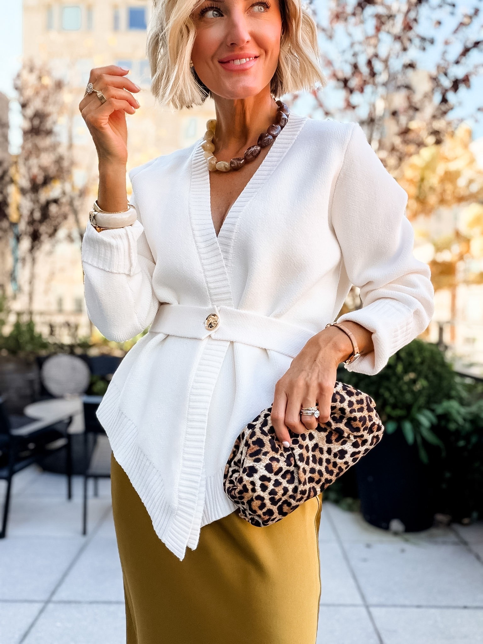 This white cardigan is an Amazon find that I am so impressed with! A classic white sweater is great to have because it really goes with everything! Wearing S! 

Loverly Grey, amazon, quince, fall outfit, white sweater, neutral sweater, maxi skirt, satin skirt, New York outfit ideas, workwear inspo

#LTKSeasonal #LTKootd