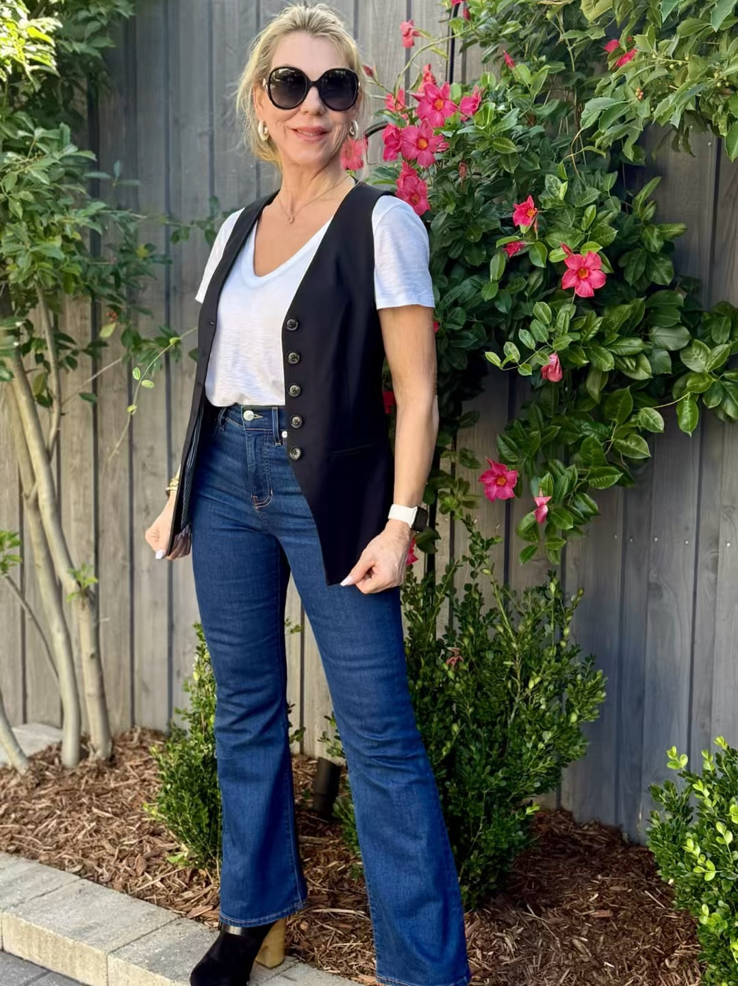 I love getting my cost per wear out of the clothes I buy and I definitely will get that from this vest! There are so many different ways to wear it. In the warmer months it looks great alone with nothing underneath or add a t shirt. As the weather cools off it looks great over a button up or a sweater. Button it up for a fitted look or unbuttoned for a completely different look. And I love that you can adjust it in the back to tighten or loosen around the waist. Very sophisticated and elegant to wear to work yet perfect for a casual outfit like I have it here.

#LTKStyleTip #LTKWorkwear #LTKOver40