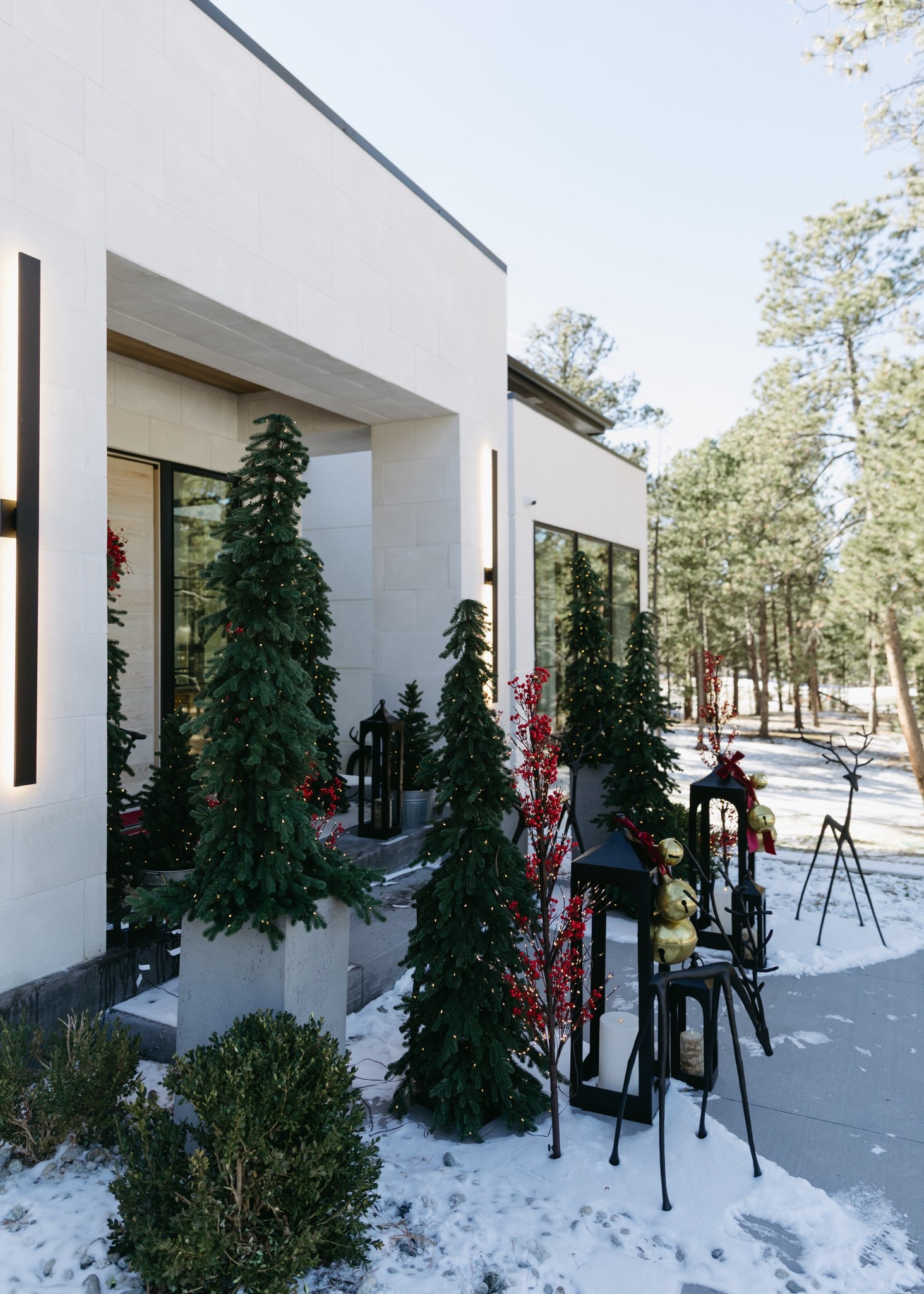 Obsessed with all of these skinny Christmas trees for the front porch! I added some extra height by styling a few of them in the Mission planters. Loving all of the dimension.

#LTKHoliday #LTKSeasonal #LTKHome