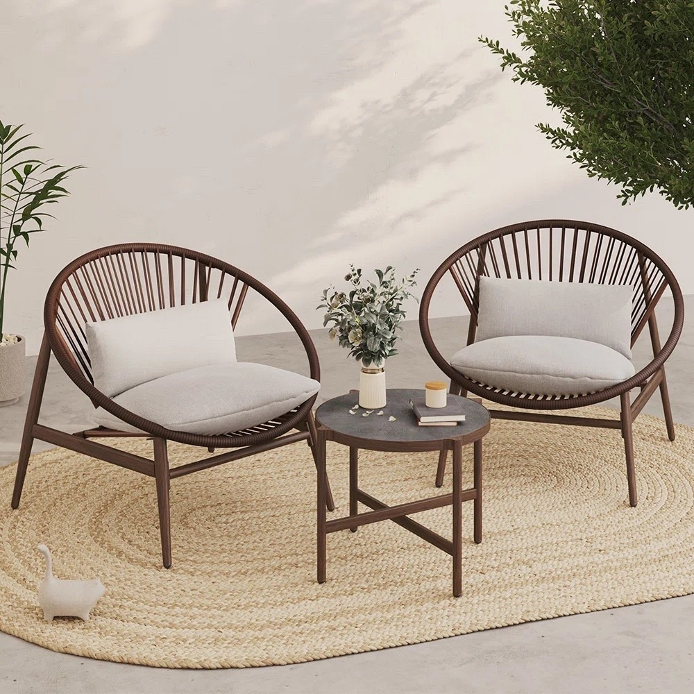 This 2-person outdoor seating set from Wayfair is such a cute setup for a balcony, patio, or quiet backyard corner. I love the rounded woven lounge chairs with light neutral cushions, plus the small matching round side table and natural woven area rug underneath. The set includes Sunbrella cushions and is currently marked 15% off at Wayfair. #WayfairFinds #PatioFurniture #OutdoorSeating #BalconyDecor