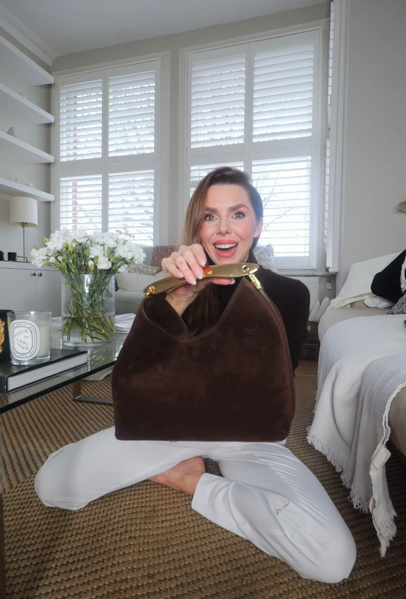 Brown roll neck styled with a matching brown belt, tailored white trousers with belt loops, and a brown suede clutch finished with a gold handle. A timeless, neutral outfit for polished everyday dressing. #bagunboxing #suedebag #brownsuedebag 

#LTKluxury #LTKbag #LTKuk