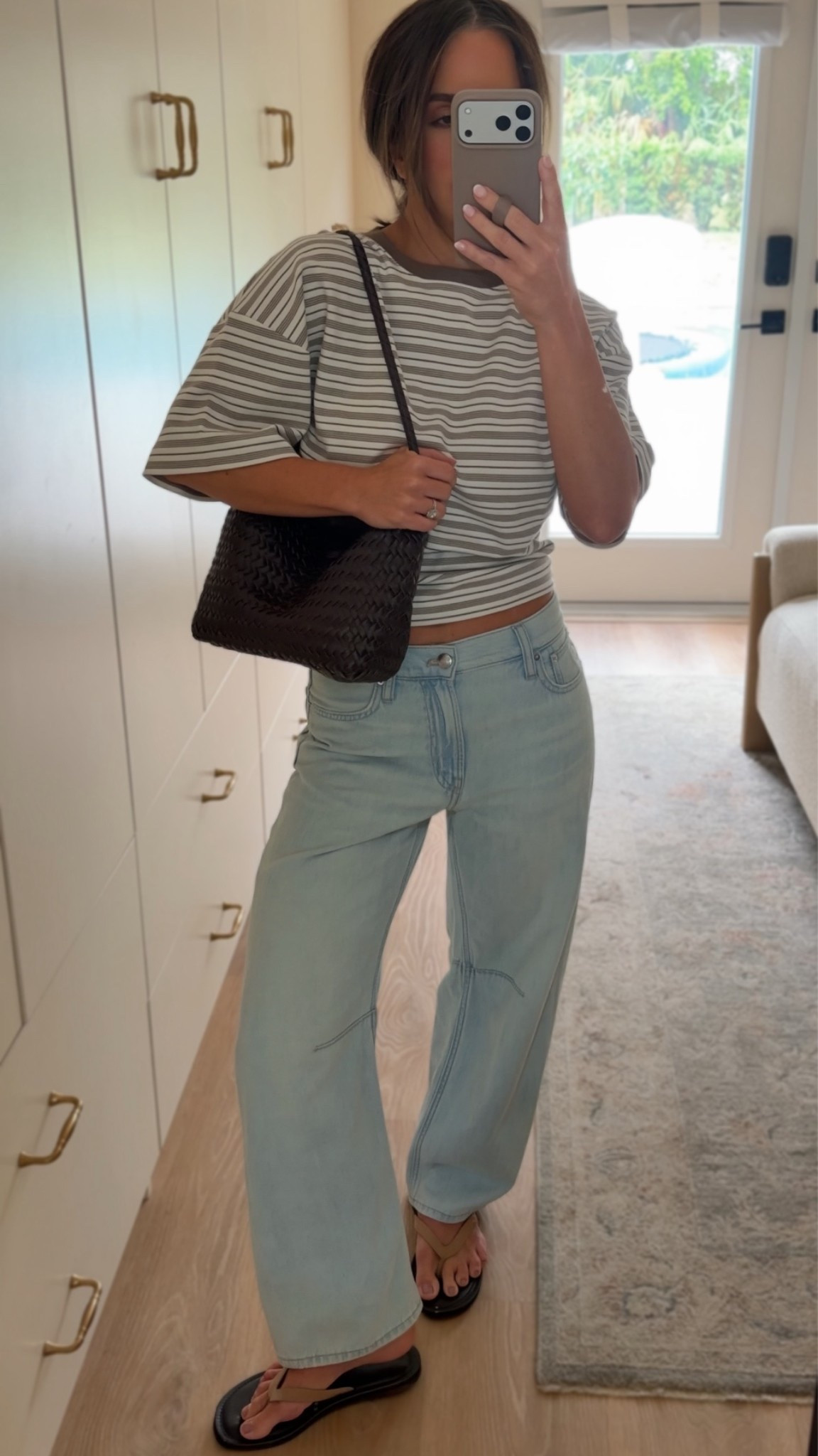 @Madewell jeans are baggy barrel chic perfection. I’m 5’2 120lbs in my true size 25 regular 
Soft light weight denim perfect for summer looks 

Top in a small - shoes are true to size

#madewell Casual Madewell outfit lately 🤍 striped tee + barrel jeans + woven bag for the easiest elevated everyday look. Loving this effortless coastal casual vibe for summer. #madewellstyle #barreljeans #everydayoutfit #casualstyle #neutralstyle #summeroutfit #effortlessstyle #coastalstyle #capsulewardrobe #ltkfashion

#LTKootd #LTKSaleAlert #LTKPetite