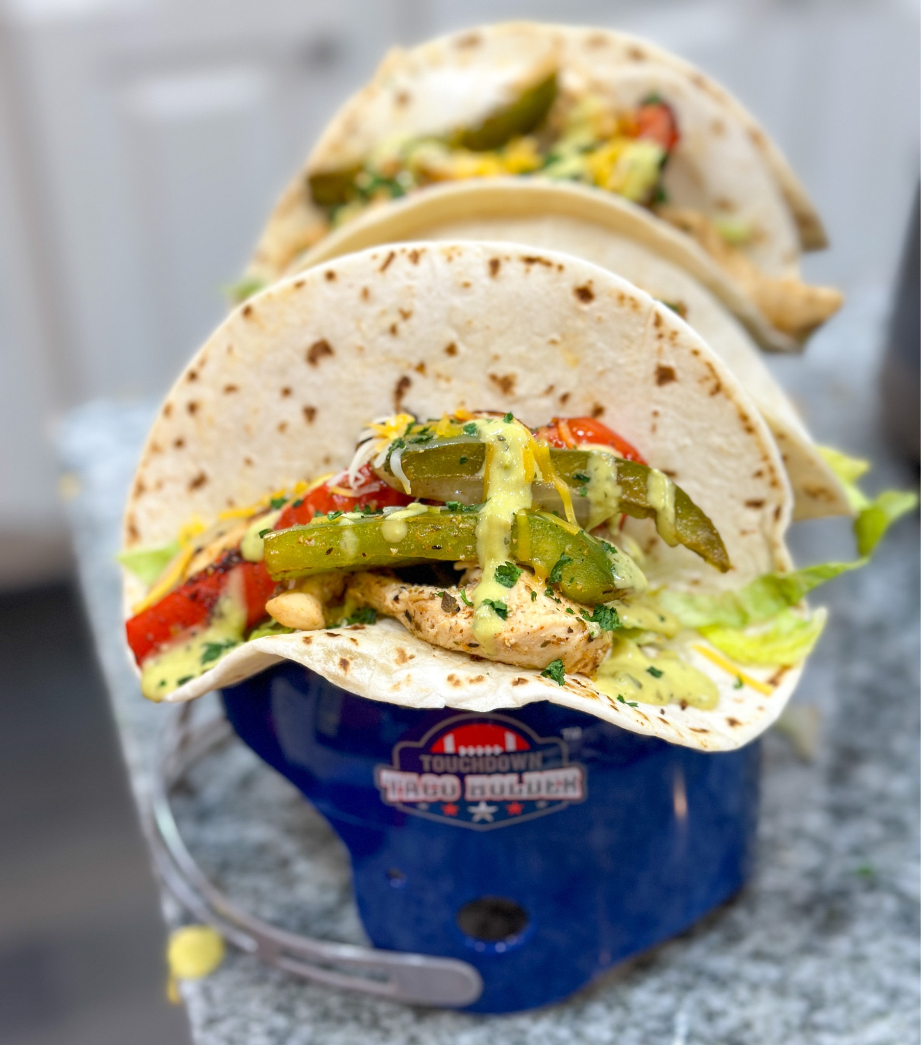 Football Helmet Taco holders are perfect for taco night. #tacos #tacoholders #footballhelmets #sportsdecor #kitchenware #foodie #homecook 

#LTKhome