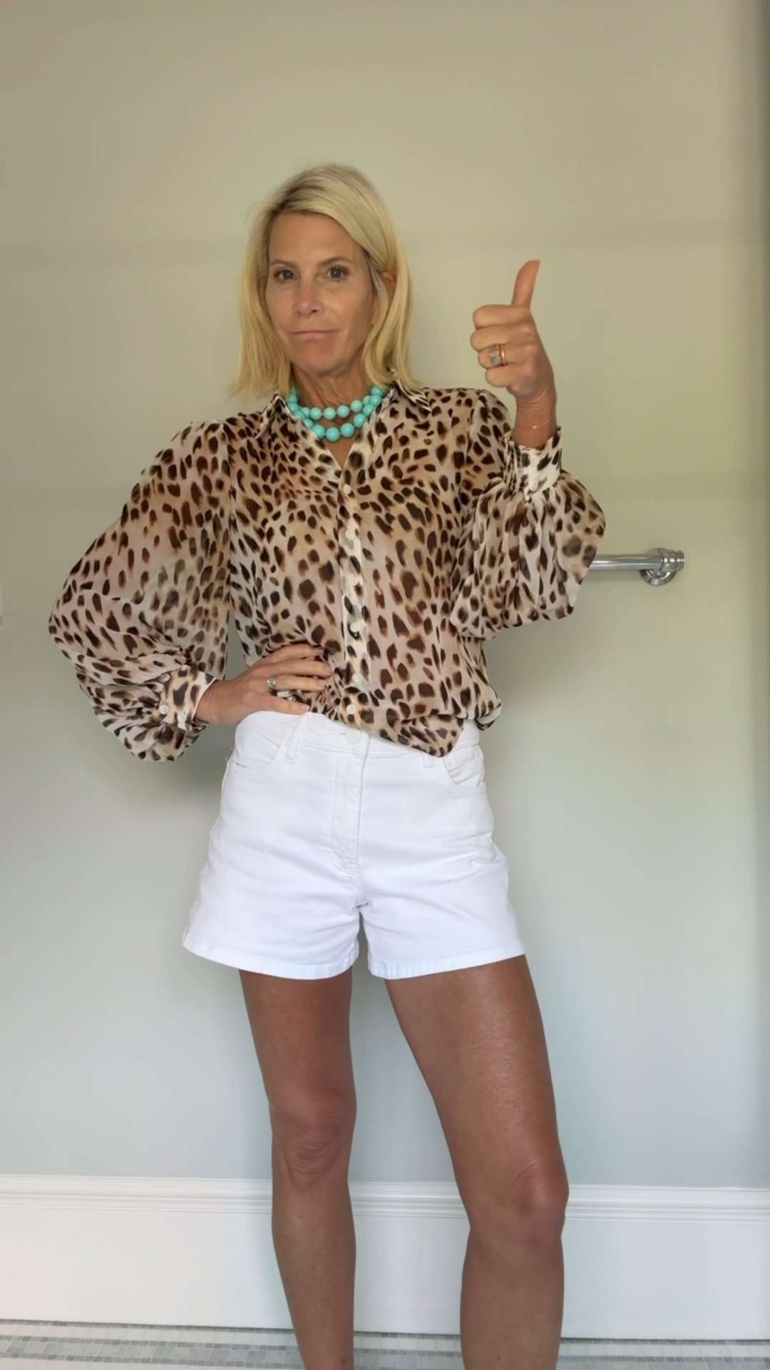 Leopard Print Blouse and White Shorts Outfit 

 #LTKootd #LTKSeasonal #LTKOver40