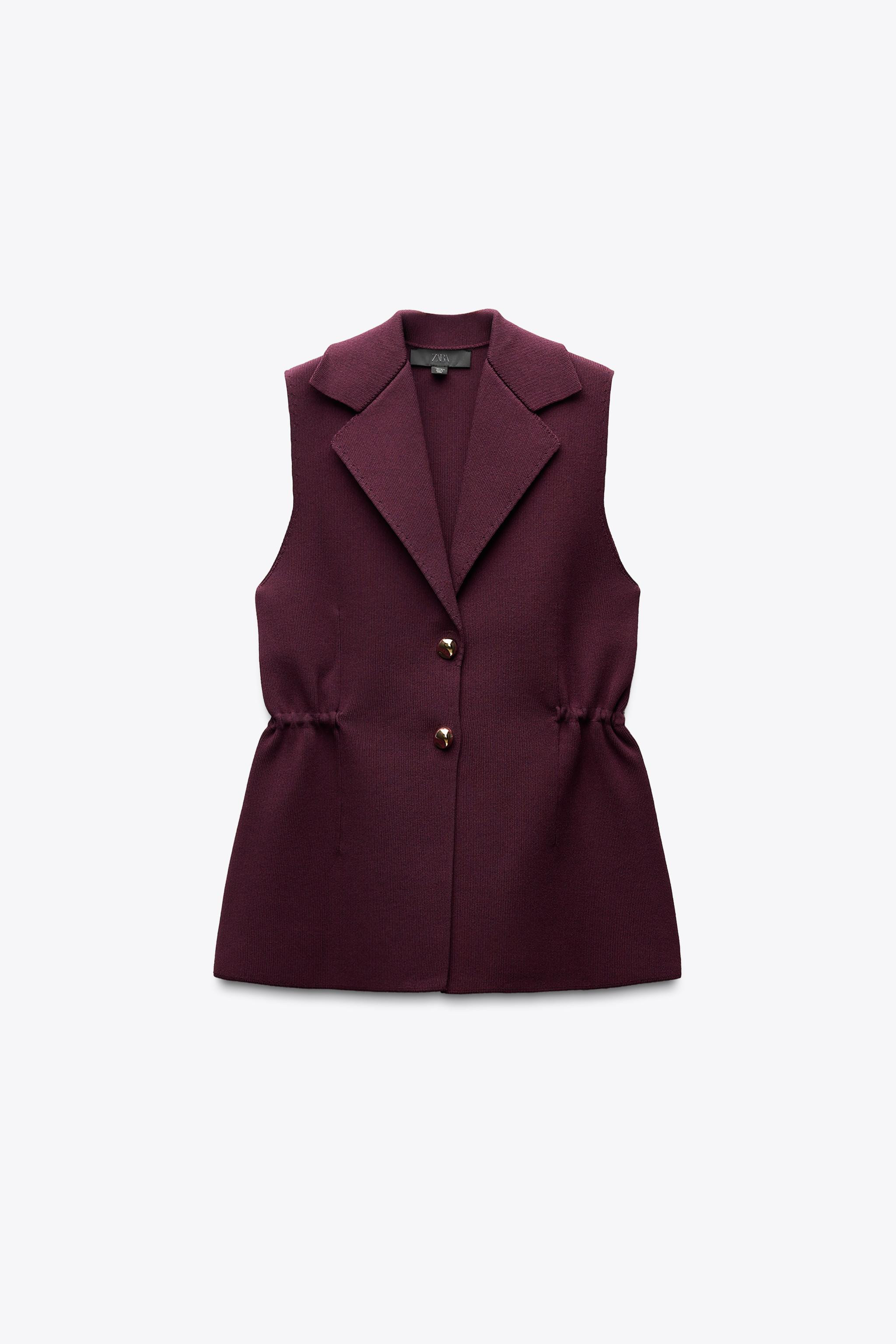 Smooth vest top with lapel collar and V-neck. Elastic side ruching detail. Front gold button clos... | Zara US