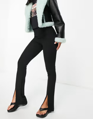 Bershka split hem flare in black | ASOS (Global)