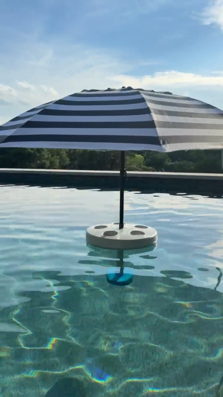 Got this pool float umbrella that holds your drinks! We don’t have any shade in our pool so this is going to be great!

#LTKSwim #LTKHome