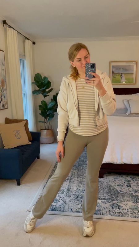 Todays casual comfy working from home outfit 

Hoodie & flared leggings fit true to size. Flared pants are on sale for $20. This color is birch leaf. 

Favorite leather sneakers - wearing my normal size.

Almost spring look

#LTKSeasonal #LTKshoecrush #LTKunder50