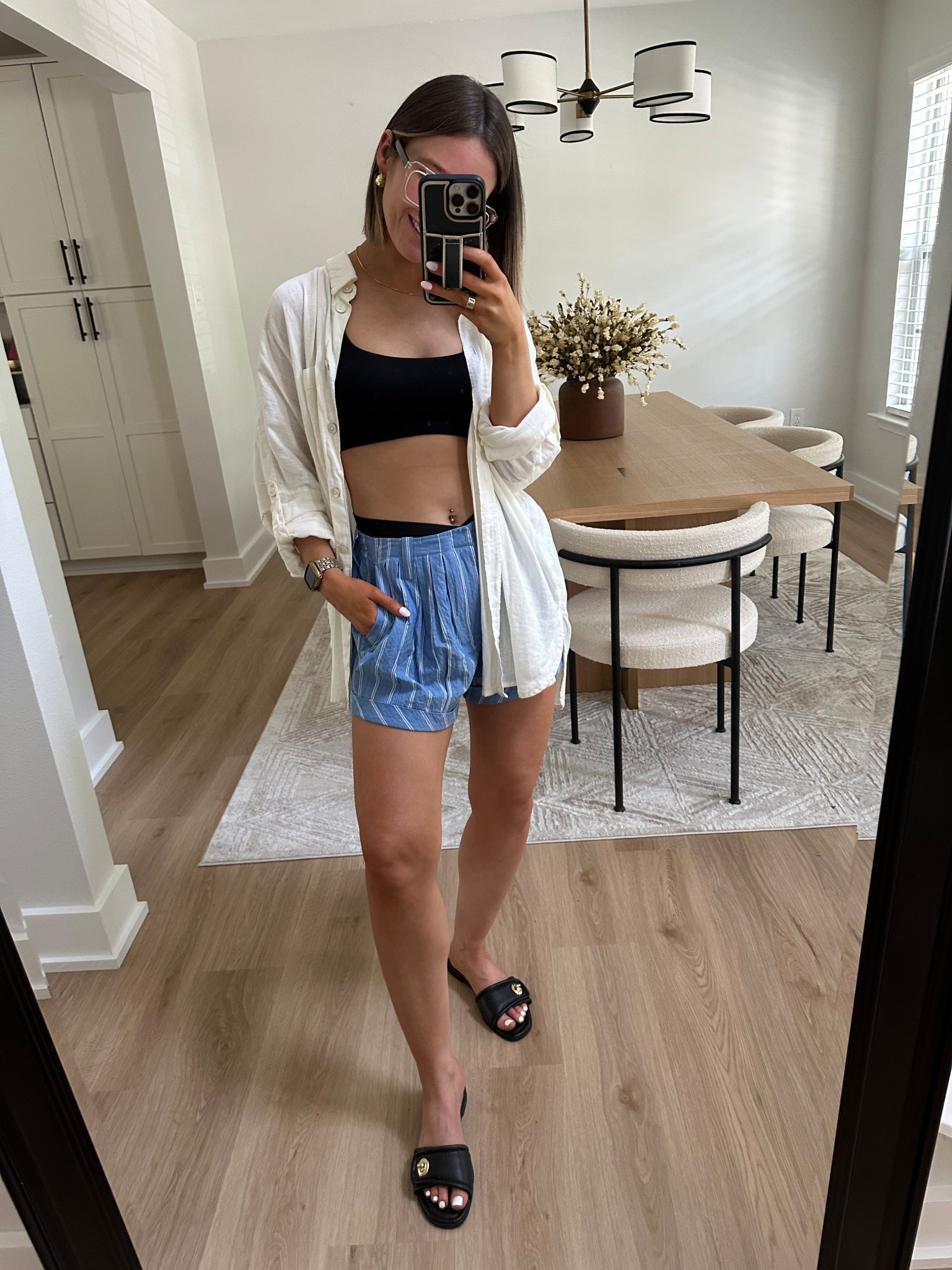 Todays pool outfit

Anthropologie plated black and white pinstripe shorts, Aerie cream oversized button down shirt, black sandals, pool outfit, beach outfit, MDW outfit, blue and white, Aerie black ribbed bathing suit, bathing suit, swimsuit, high waisted swim bottoms, crossover swimsuit, bikini top, bikini bottom 

#LTKSummerEdit #LTKSwim #LTKTravel