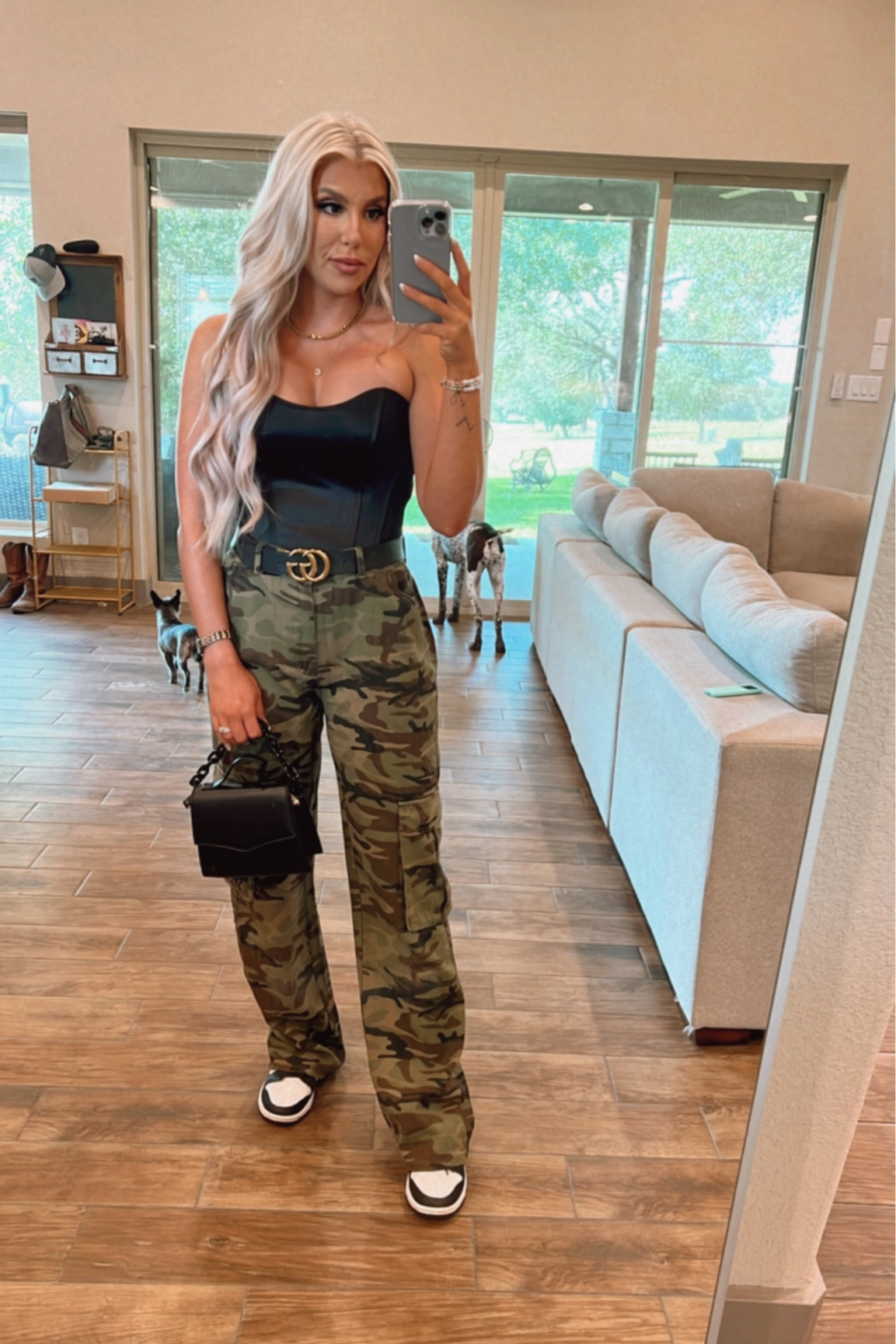 Concert season! Concert outfits, camo cargo pants, nike dunks, panda dunks, black corset top. 

#LTKFind #LTKSeasonal #LTKshoecrush