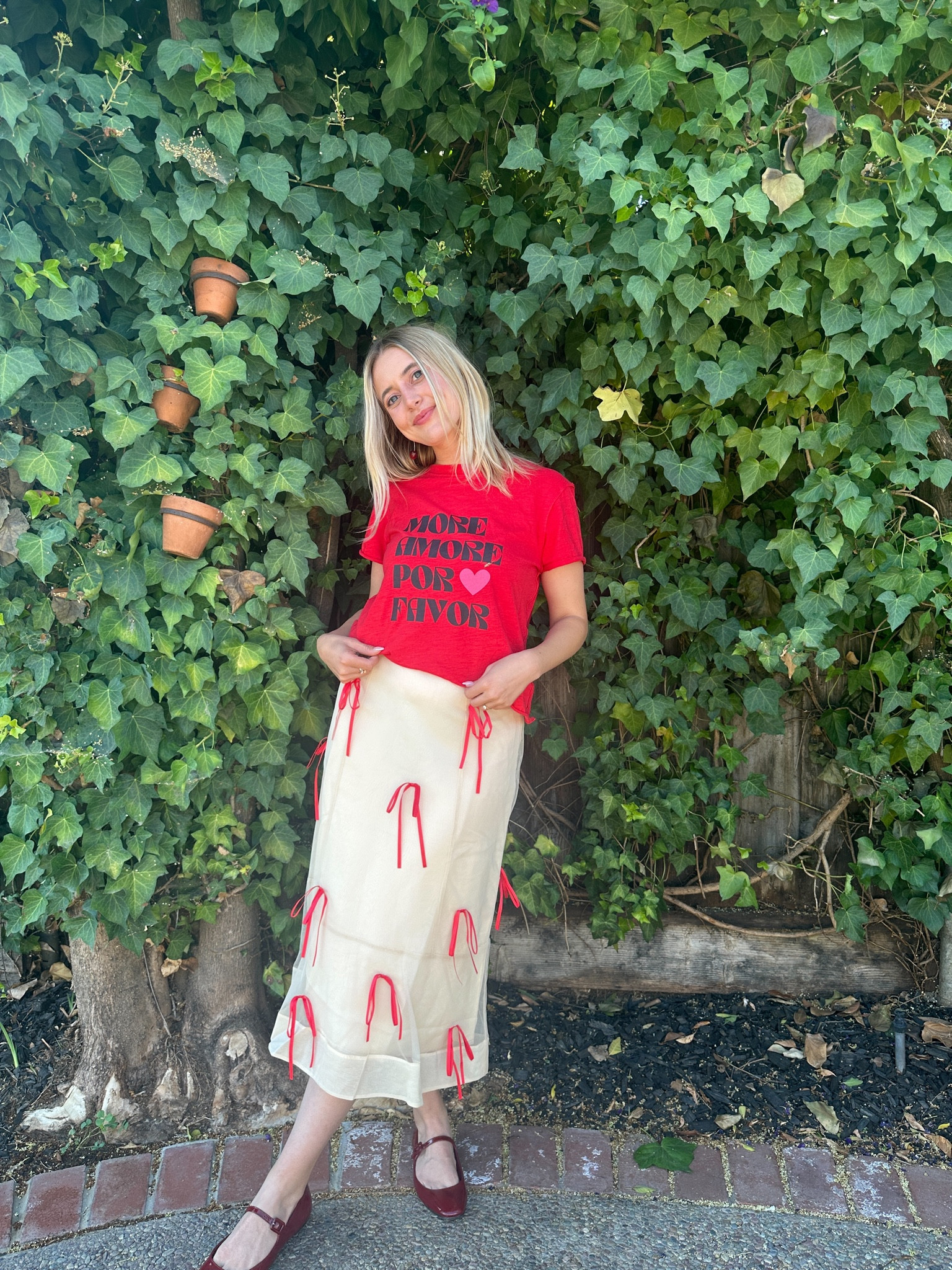 Can it be Valentines Day already so I can wear this adorable outfit?? 🍒❤️‍🔥👠
Pops of red have never been more fun with this Anthropologie outfit! Loving the red ribbons paired with the more amore Por favor shirt! Even the cherry earrings are Anthropologie!

Accessories are red Mary Jane flats + cherry earrings!

#LTKParties #LTKxNSale #LTKSeasonal