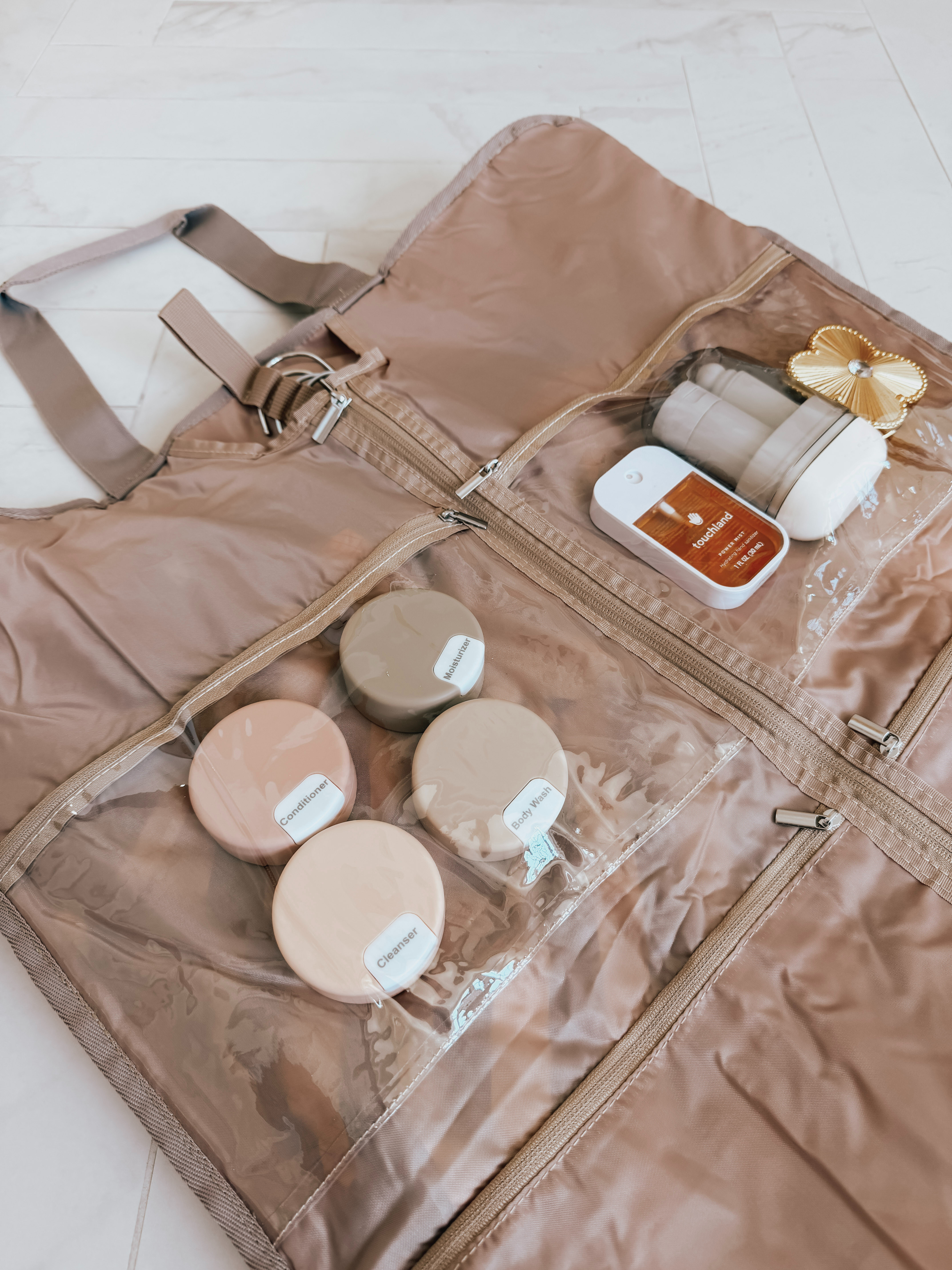 This garment travel bag keeps everything organized in one place. It lays completely flat so you can pack your clothes, then zips into a duffel bag with separate compartments for shoes, toiletries, underwear, socks, and all of your travel essentials. It’s such a smart way to stay organized, save space, and help keep your clothes looking great while you’re traveling. 

 #LTKTravel