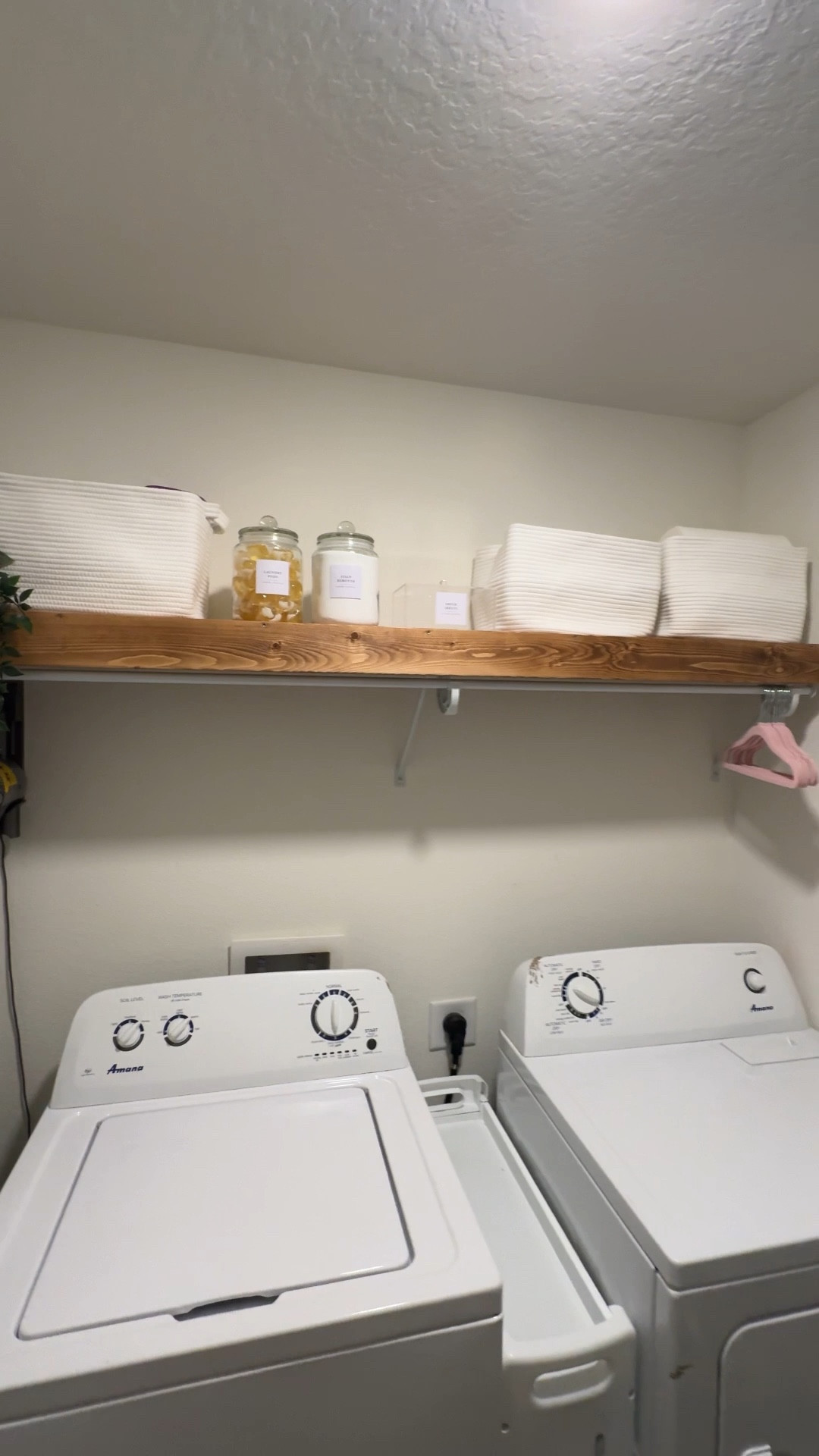 If you are looking to upgrade your laundry room on a budget this is for you! Super simple DIY shelf and some organizing tools will completely change your space! #homedecor #decorate #organize 

#LTKFamily #LTKHome #LTKFindsUnder100