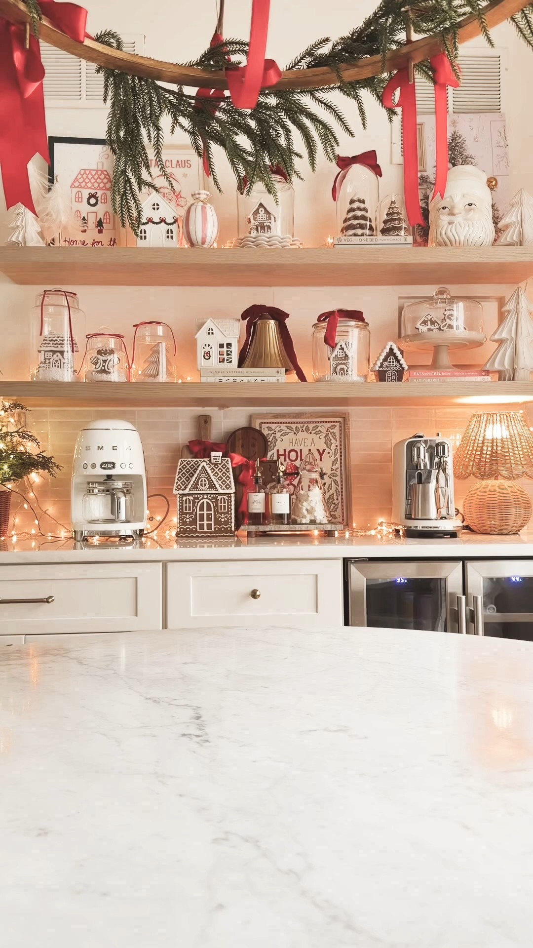 Comment ✨SHOP✨ for links!! An elegant Christmas kitchen starts with one statement piece—and this  gold Santa is that piece!! ✨ #ad I love how this centerpiece came together with these @wayfair finds! The gold Santa and these glitter Christmas trees are beautiful!! #Wayfair #WayfairPartner all the links in my LTK ⬇ https://liketk.it/5FvWL #christmasdecor #christmascenterpiece 