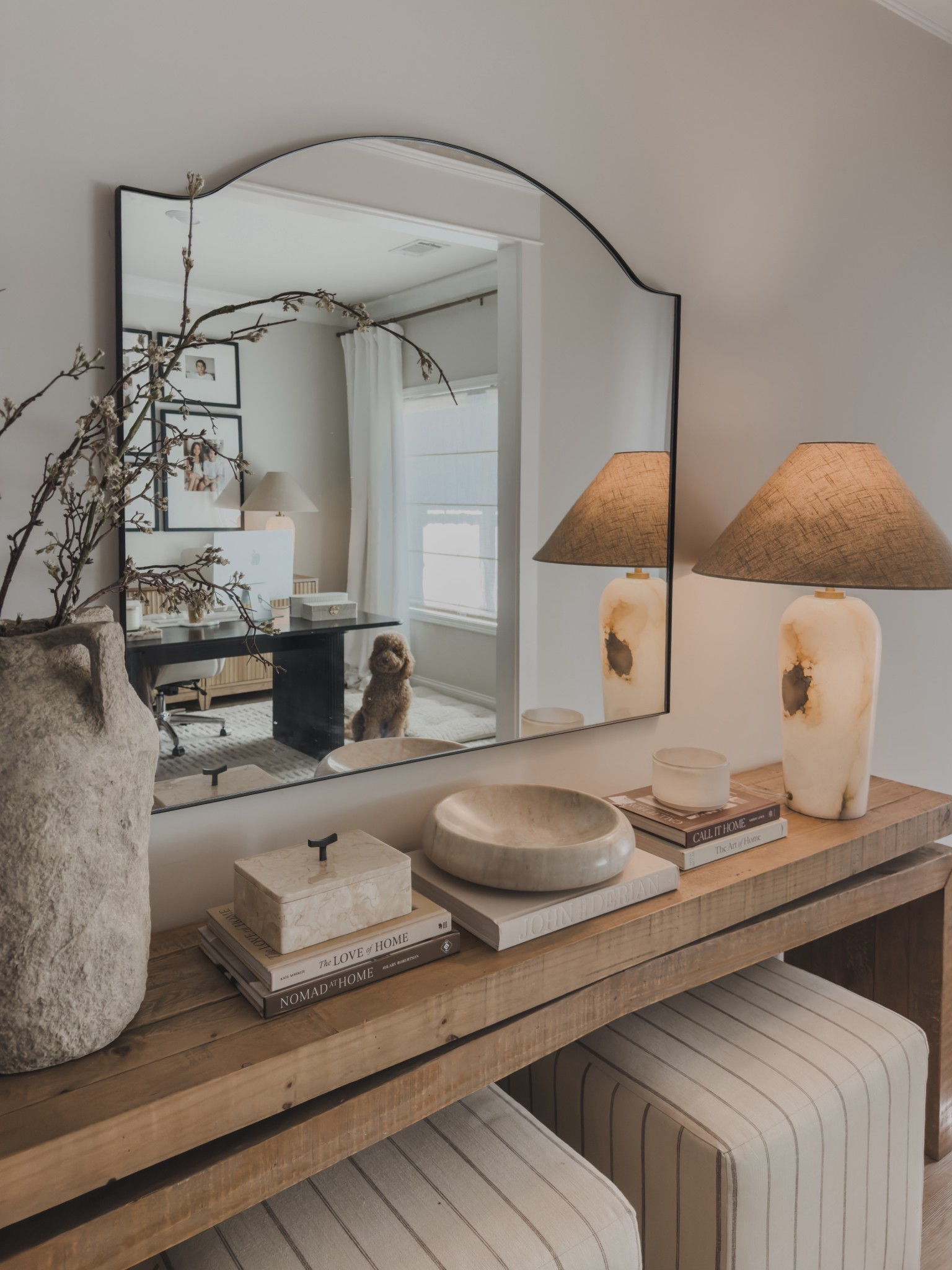 One of my absolute favorite views — looking into my office from my front entry way. Loving all of these quality furniture finds. A mix of aesthetic and functional. 

The prettiest stripped ottomans, alabaster lamp (the base lights up — so stunning) a dining table as a desk that is currently 60% off 🫶🏼 

Sharing all of the details of this space for an early spring style inspo.

Furniture finds, home details, wayfair home, pottery barn style, home inspo, shop the look! 

#LTKSaleAlert #LTKHome #LTKSpringSale