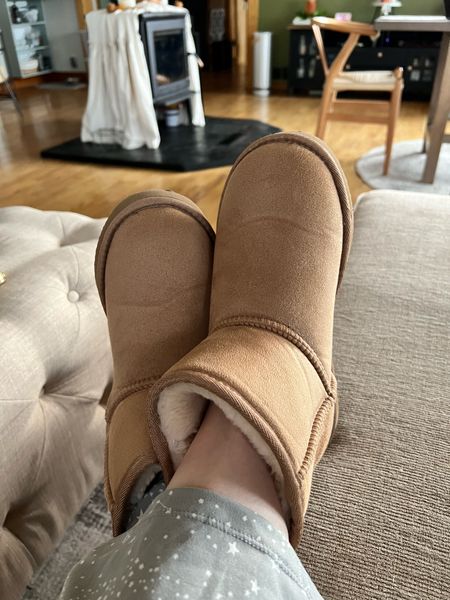 These slippers or boots are so comfortable and so soft on the inside! They are such a perfect dupe for Ugg boots at a fraction of the price! I have had and still have several Ugg boots and these feel exactly like them. I highly recommend! They come in 3 colors.

#LTKunder50 #LTKhome #LTKstyletip