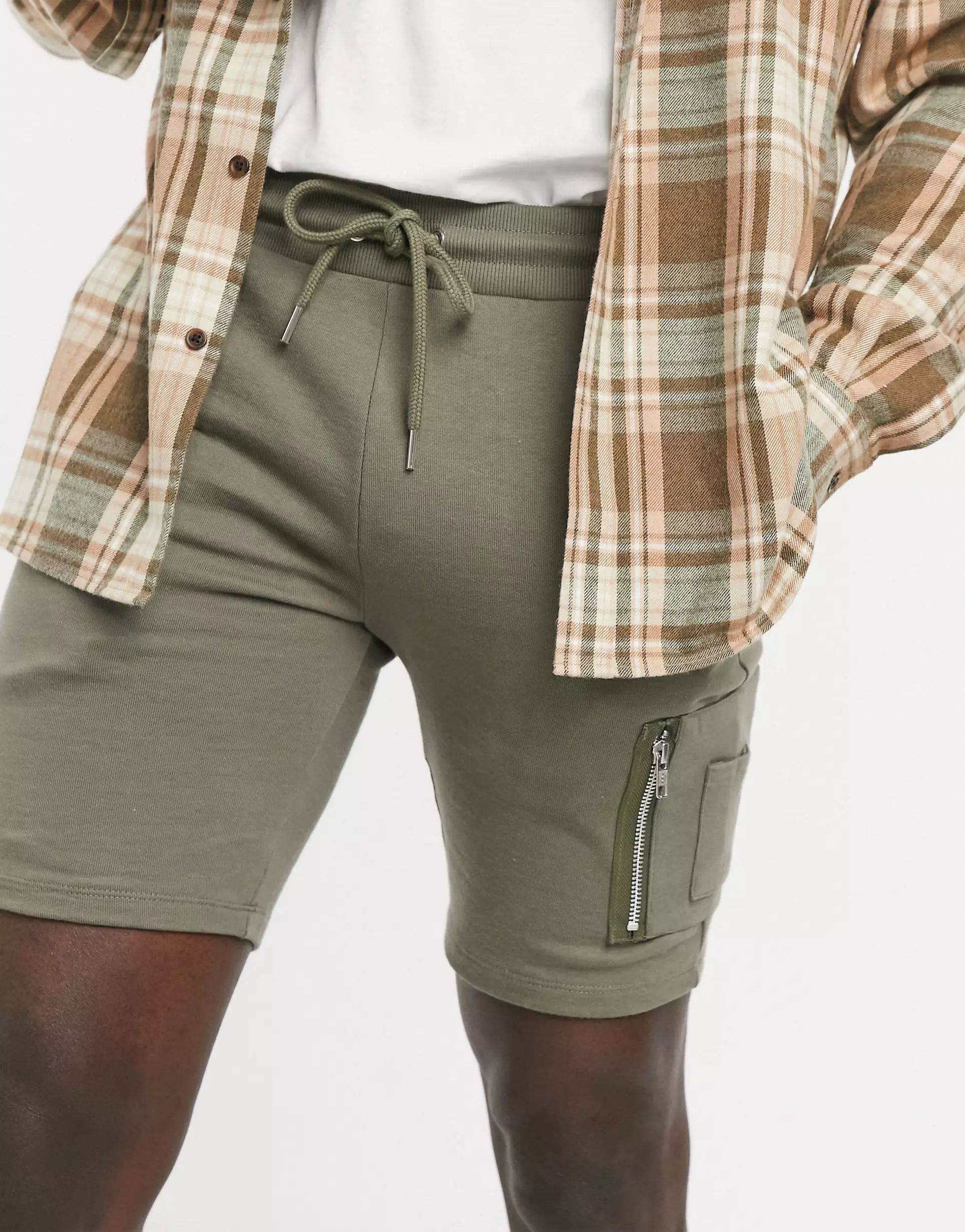 ASOS DESIGN jersey skinny shorts with MA1 pocket in khaki | ASOS (Global)