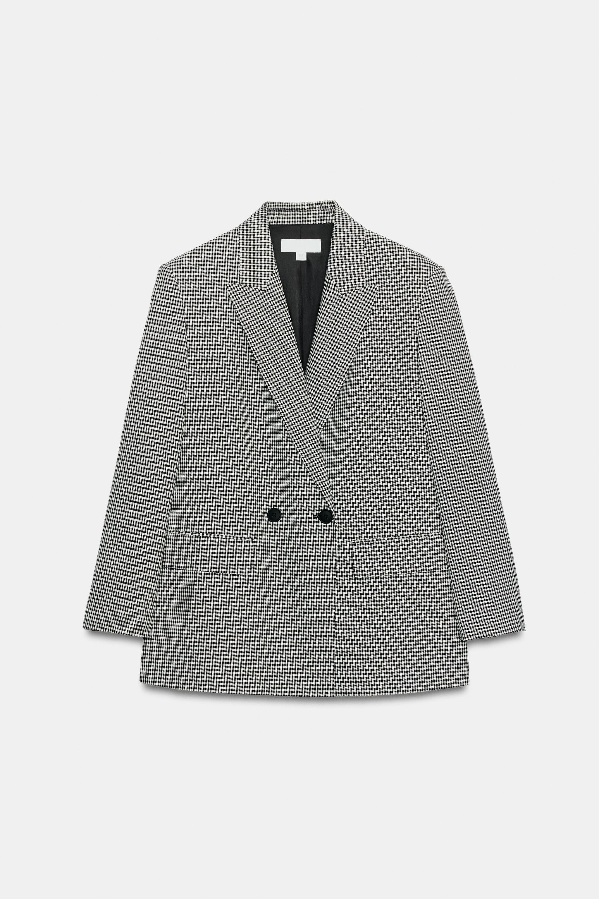 Model height: 174 cmOversized blazer with a regular collar, long sleeves and shoulder pads. Featu... | Zara UK