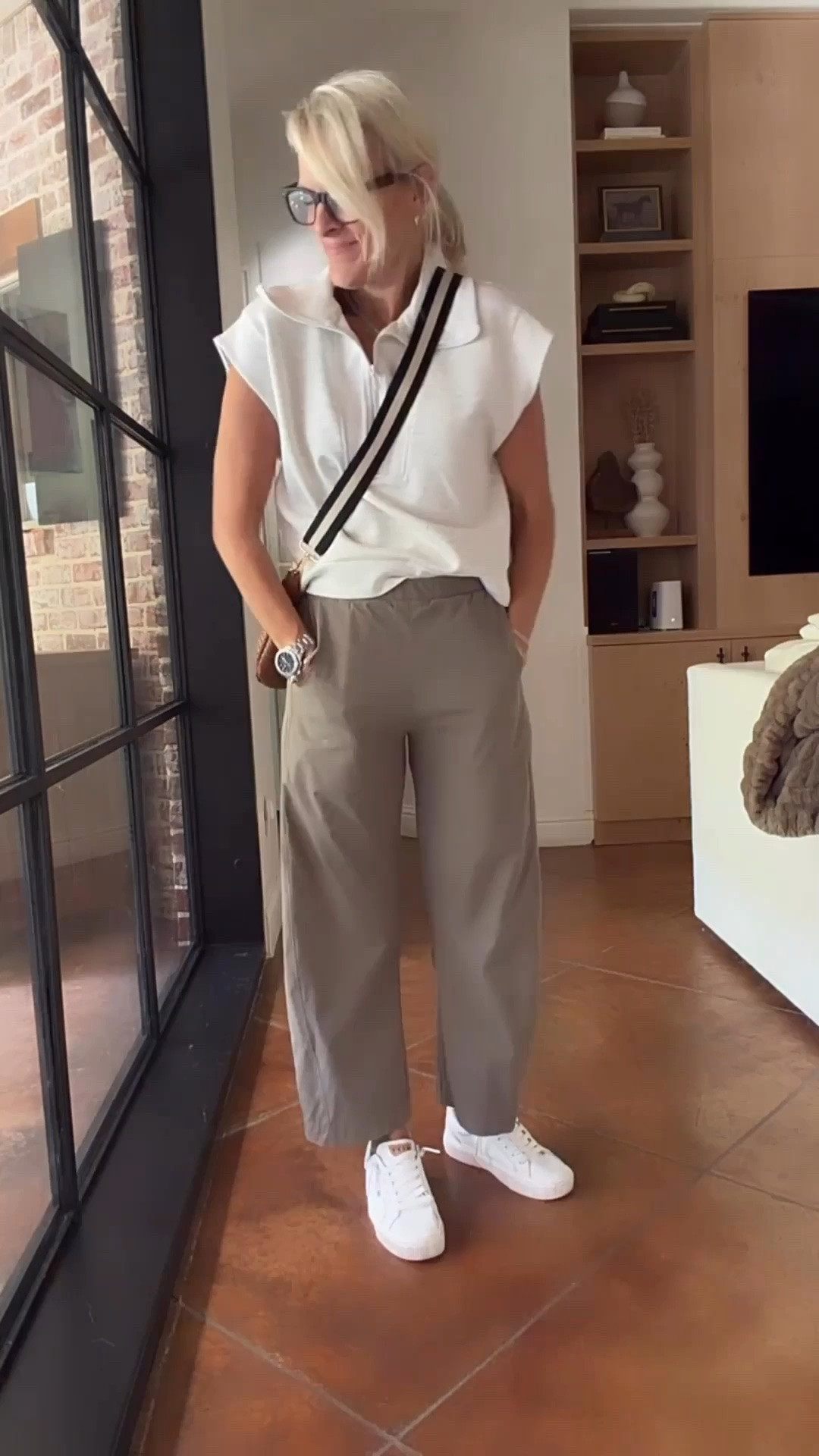 These cropped barrel-leg pants are such an easy wardrobe staple. The lightweight, stretchy fabric makes them comfortable for workdays, travel, and everyday wear, while the pull-on waistband keeps the look polished and easy. I love them with this crisp white sleeveless top, but they’d also work beautifully with a tee, sweater, blazer, or sneakers.

💡 LTK MADE EASY
❤️ Heart = Support my posts!
🔖 Save = Get sale & restock alerts
📋 Lists = Keep favorites organized
📲 Share = Send lists and products to a friend. Hello, Christmas List!
💬 Comment = Ask me anything about what I’m wearing.:-)

#LTKootd #LTKgrwm #LTKOver40