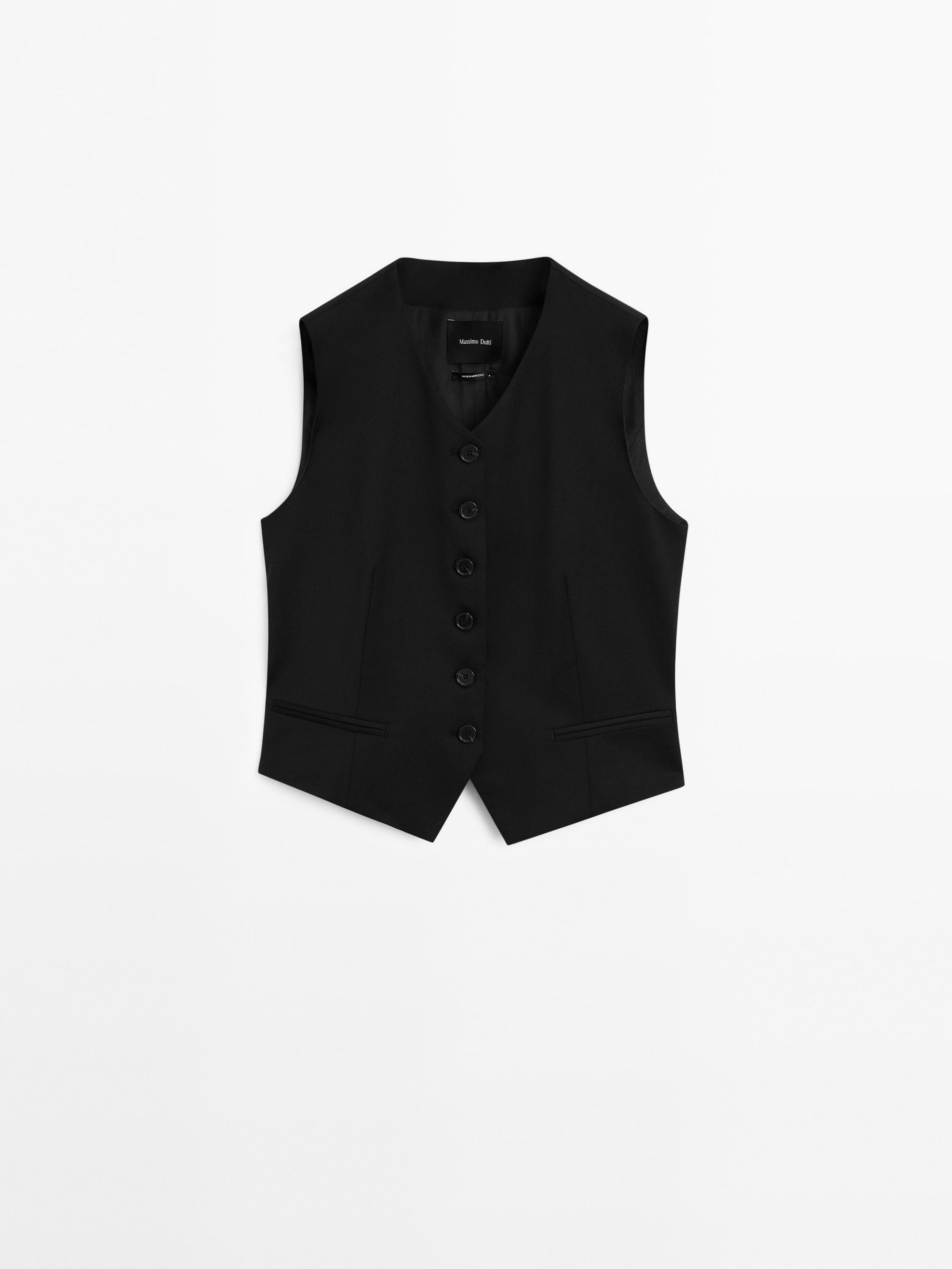 Vest made of 100% wool fabric . V-neck. Sleeveless. Button-up front. Two side pockets. This garme... | Massimo Dutti UK