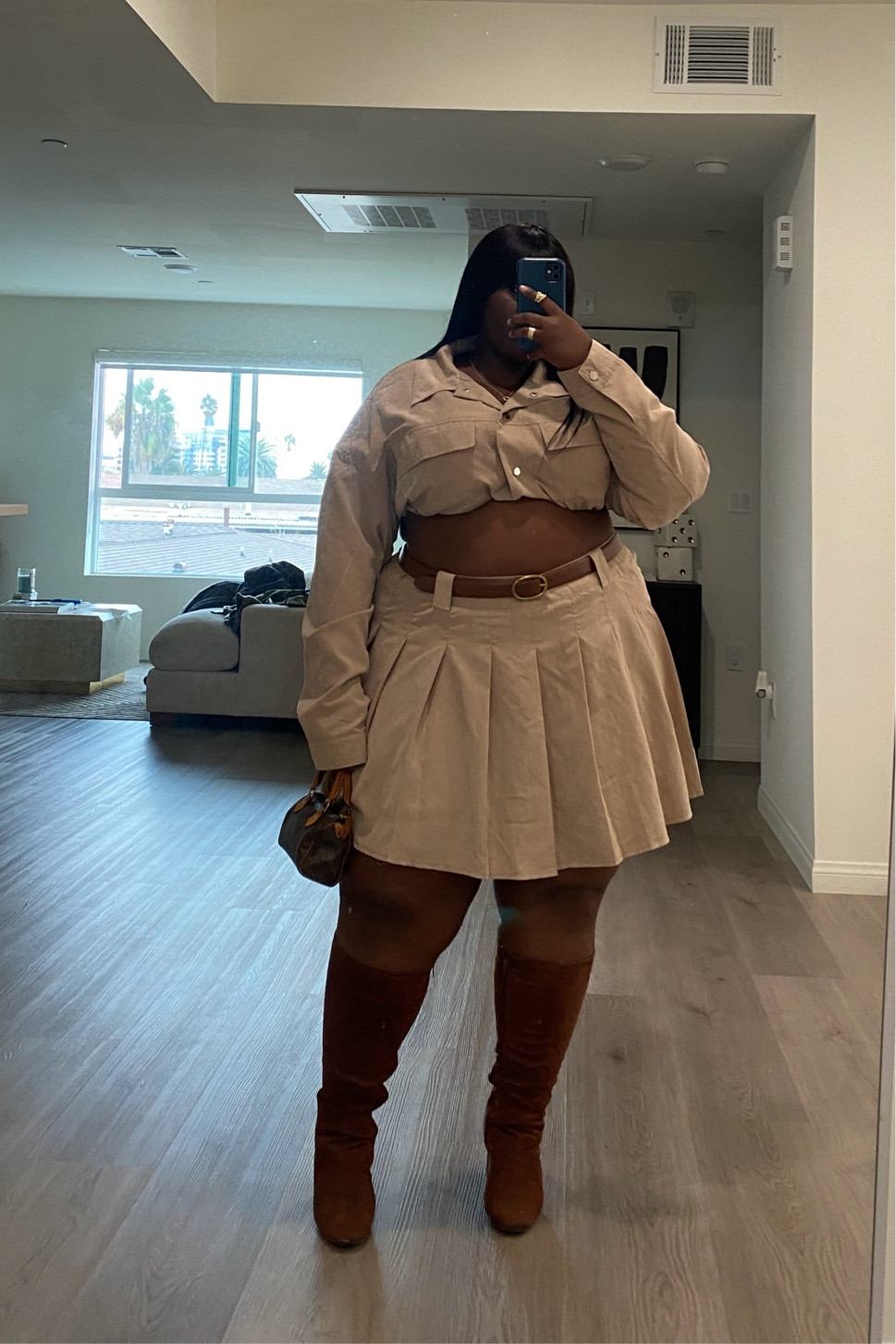 pleated mini skirt and brown boots from plt 🤍

#LTKFindsUnder100 #LTKFindsUnder50 #LTKStyleTip