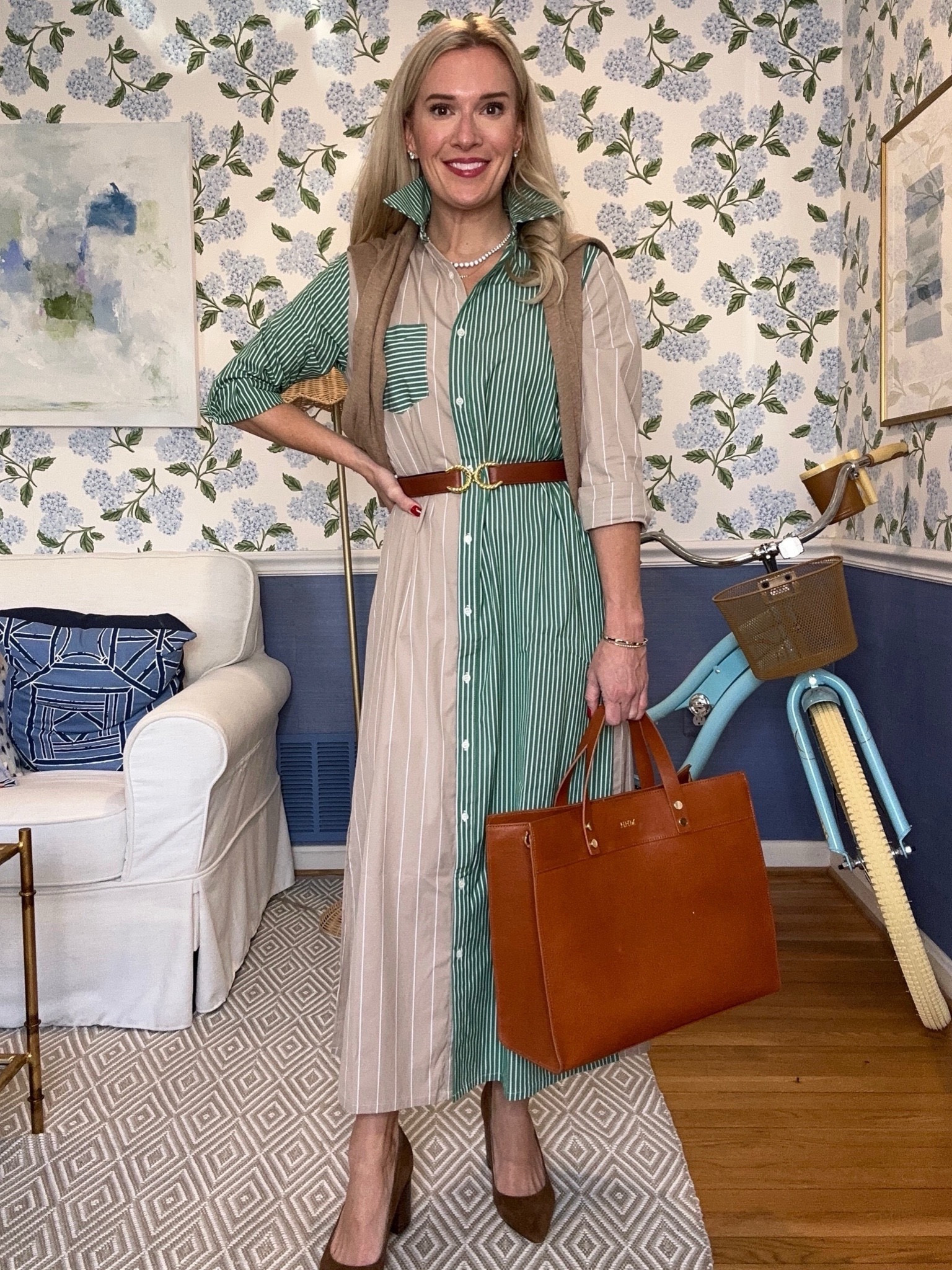 Talk about a classic look! This dress’s vertical stripes keep the silhouette long and it’s super flattering. I love the different striped panels. It is true to size and I’m wearing an XS. I’m 5’4” if that is helpful. My personalized tote is the perfect size for my laptop and files. I also love that it’s structured enough to stay standing up. My heels are on major sale and run tts.

Meredith Hudkins, preppy, classic, timeless, traditional, women’s fashion, coastal fashion, vacation outfit, women’s outfit, outfit, inspiration, ootd, Tuckernuck, Nordstrom rack, vacation, outfit, teacher, outfit, belts, J, McLaughlin, Martin, Graham, leather purse, tote, Mother’s Day, maxi dress, Nordstrom, suede heels

#LTKworkwear #LTKSeasonal #LTKstyletip