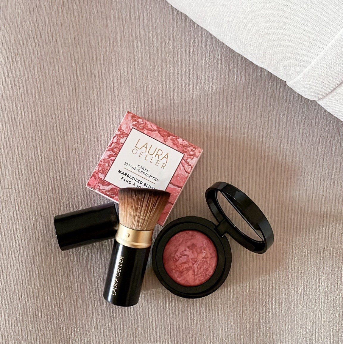 Laura Geller baked blush and retractable angled brush  

#LTKBeauty