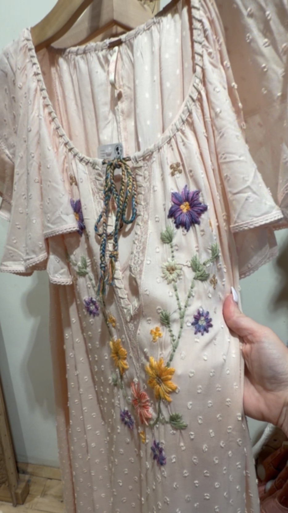 This might be the most beautiful, simple, elegant midi dress I’ve ever seen. 😍 The peach blush hue with floral embroidery is perfect for a summer wedding guest dress, or perhaps a graduation… in stock now at Disney Springs!

#LTKWedding #LTKdayinmylife #LTKvlog
