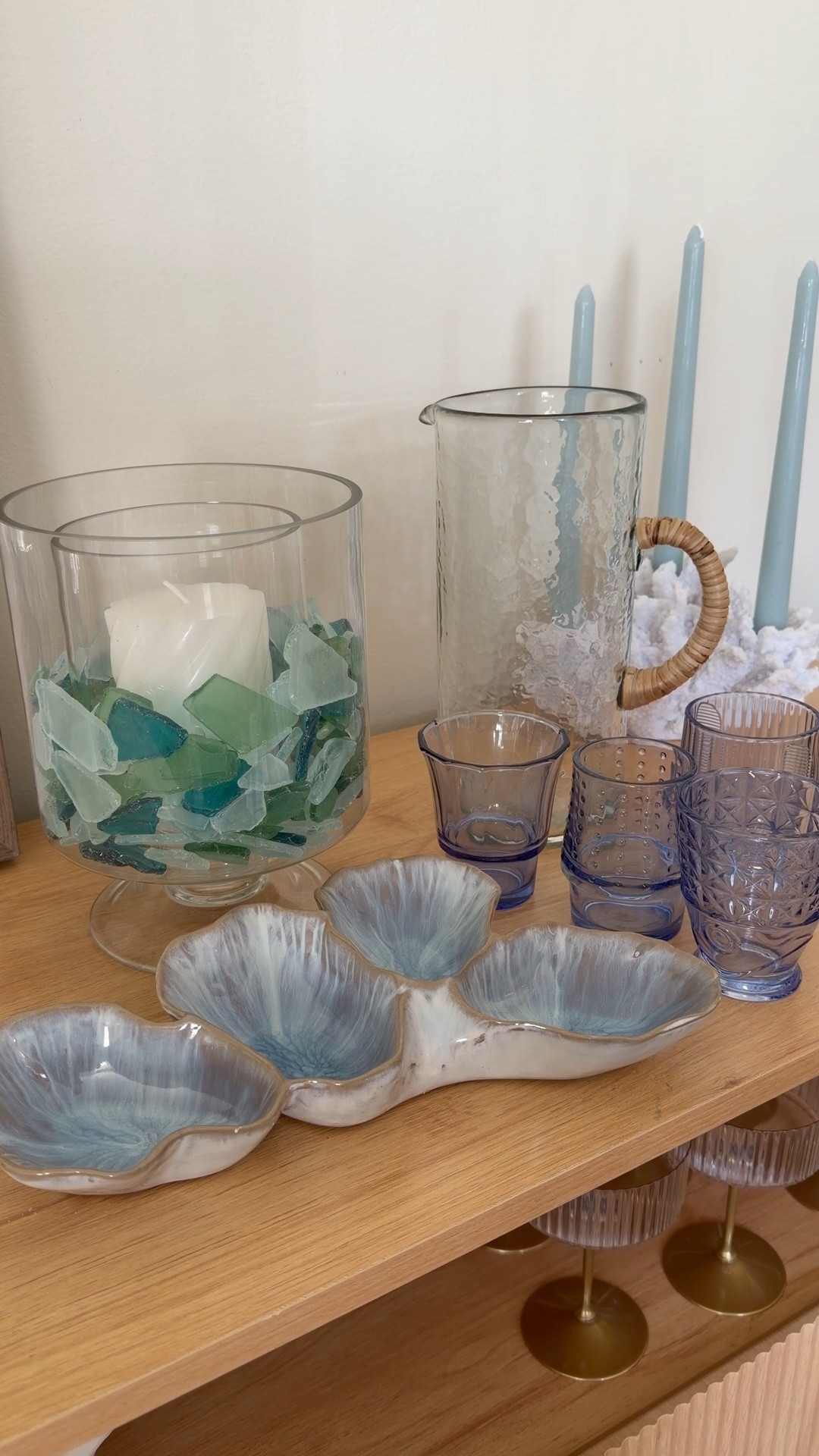 Michael’s new Modern Coast collection is everything I want for summer decor and it inspired me to come up with these beach themed candleholders! Michael’s has everything from shells to sea glass to sand for your crafting needs and I can’t wait to bring these out on a warm summer night! I paired them with my favorite pieces from the Modern Coast collection—the stacked fish glasses are my number one! 

Follow @michaelsstores and share how you #MakeItWithMichaels! 

#michaelsmaker #everythingtocreateanything

#LTKHome #LTKSeasonal