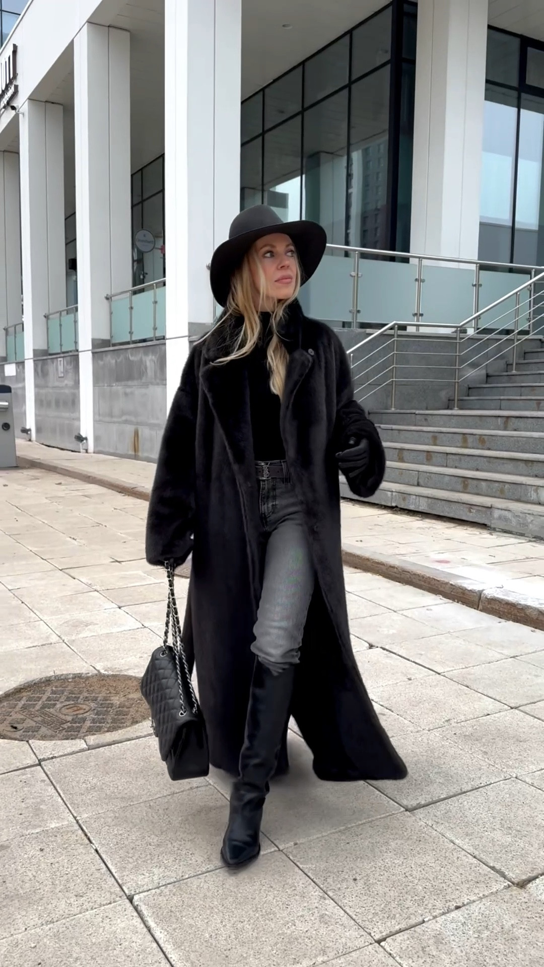 Dark gray faux fur coat, shearling coat, gray and black outfit, long black leather gloves, Levi’s gray slim fit jeans, black western boots 

#LTKSeasonal #LTKOver40 #LTKFindsUnder100