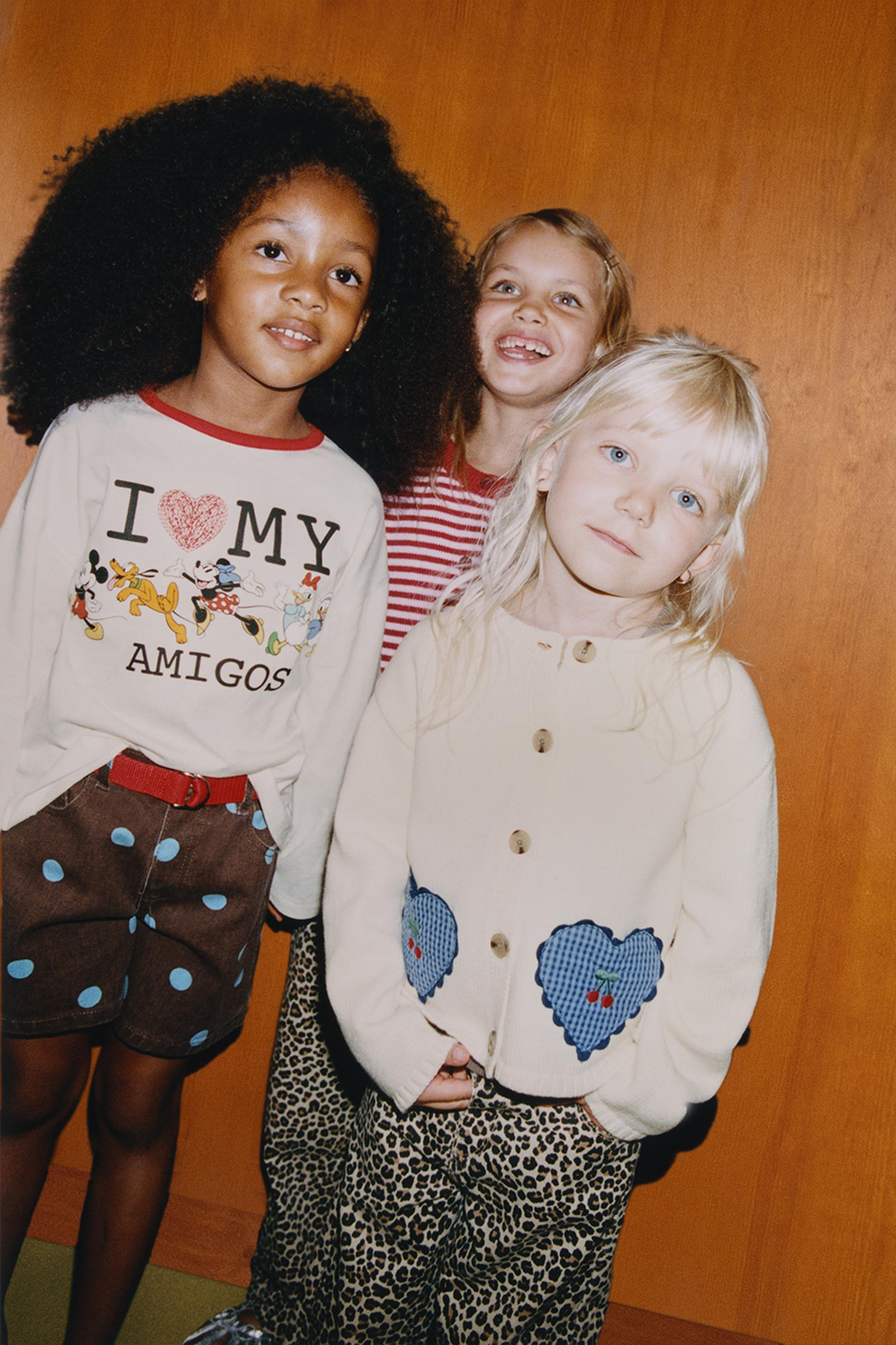 Knit cardigan with a round neck and long sleeves. Featuring front button fastening and heart-shap... | Zara UK