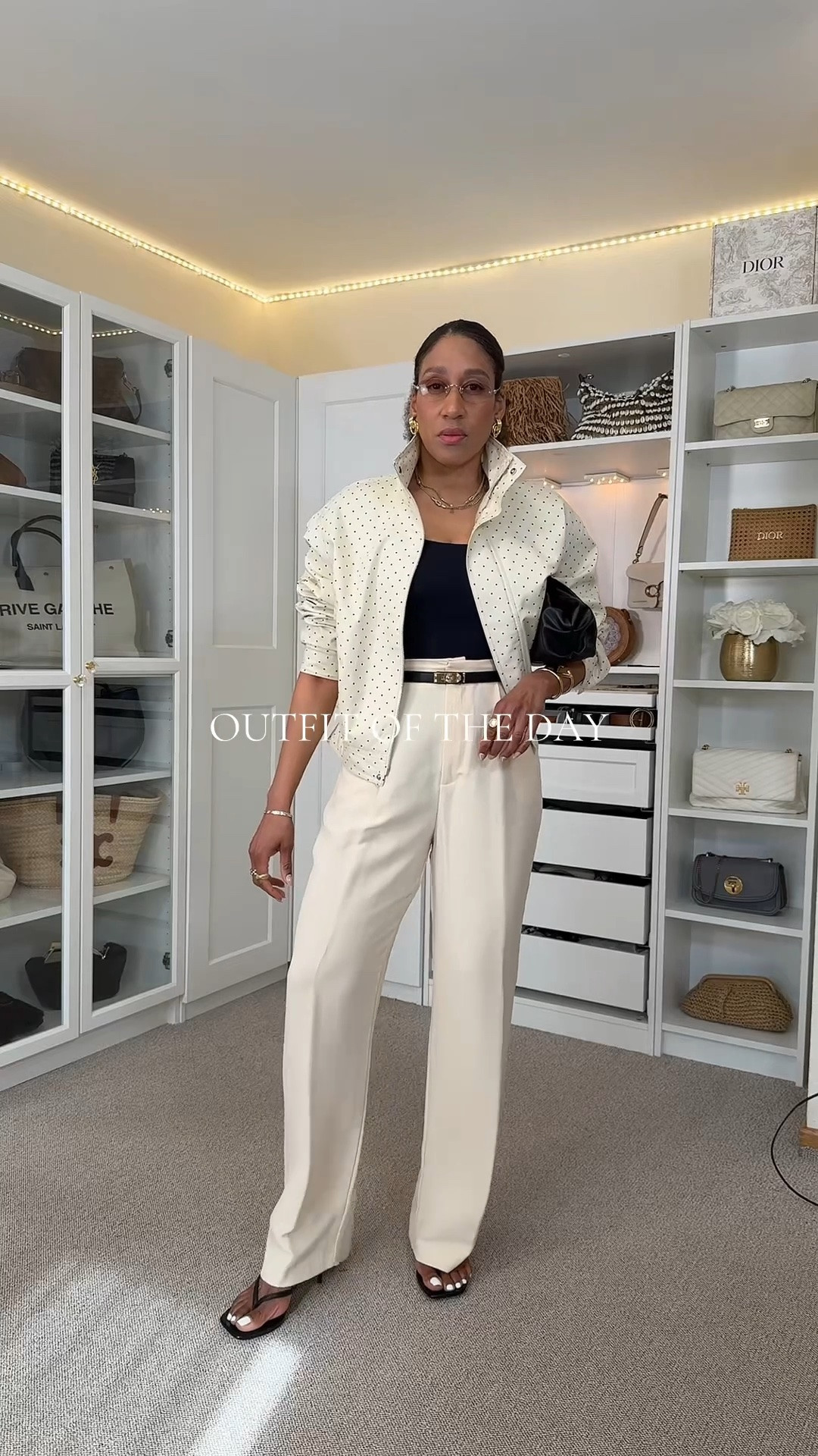 Spring outfit idea with butter yellow pants, black tank top, funnel neck jacket, thong sandals, kitten heels, clutch bag, Amazon belt, MiuMiu sunglasses, Chanel perfume, YSL beauty. Outfit of the day, ootd. LTKEurope LTKfashioncreator

#LTKootd #LTKOver40 #LTKSaleAlert