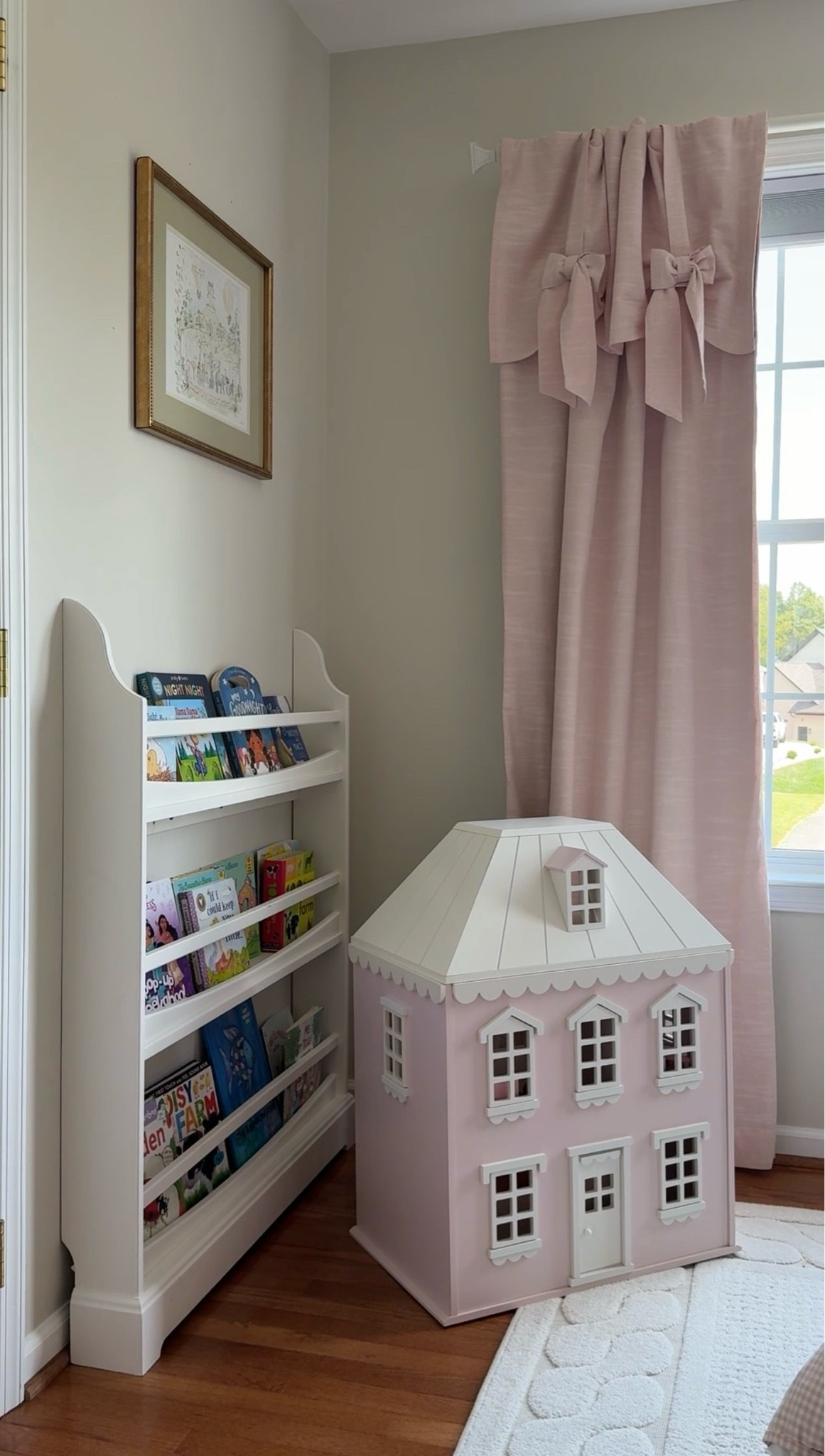 Girls room, big girl room, little girl bedroom, playroom, nursery, pink bedroom, grandmillenial, bow decor, dollhouse, pink curtains, wallpaper, bookshelf