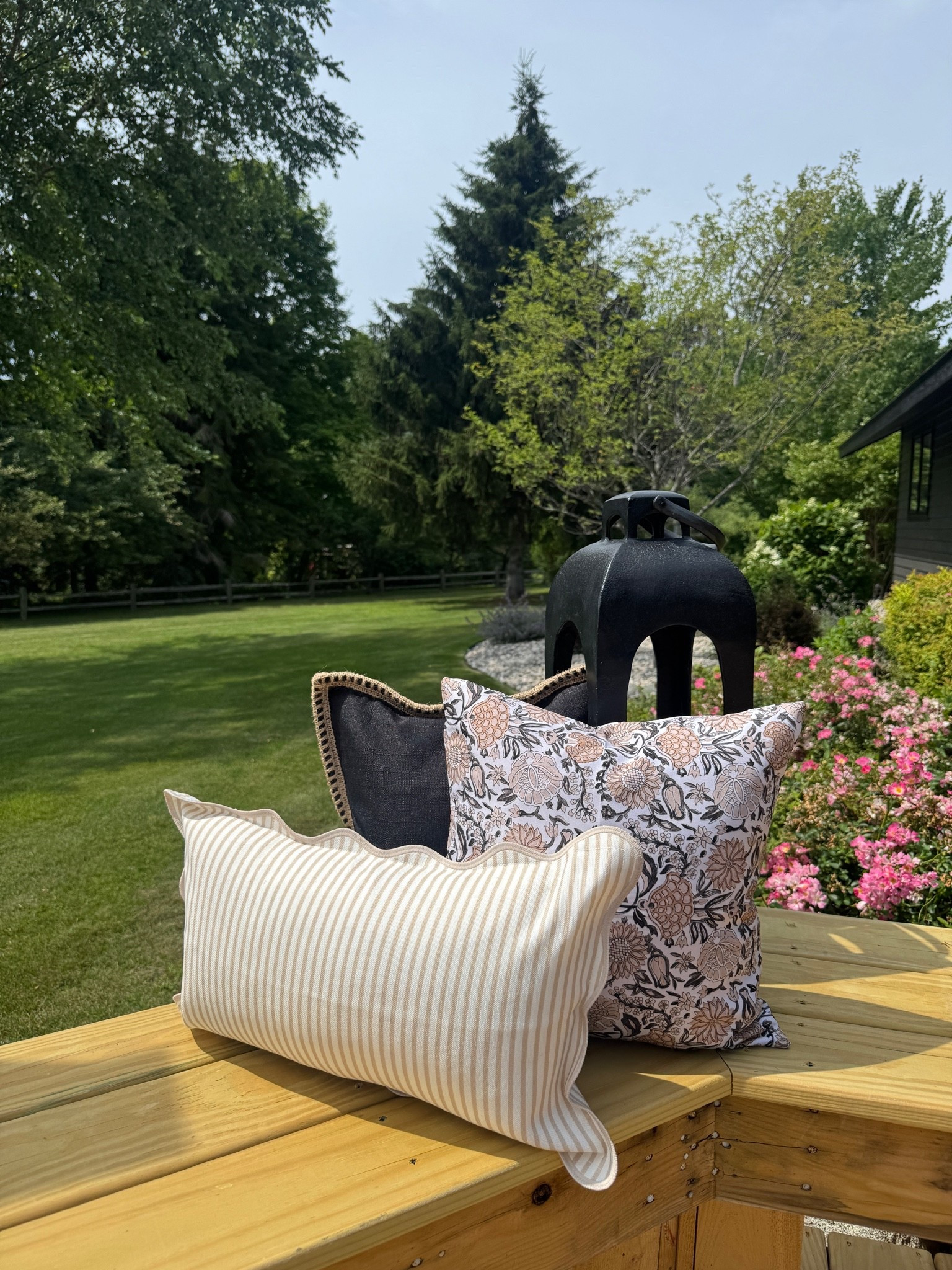 Transitioning into a more summery, neutral vibe over here! ☀️🤍 I was ready for a break from all the bright red after the 4th, so we switched things up. These outdoor pillows are the perfect touch for a casual, neutral outdoor space. 🖤

#LTKHome
