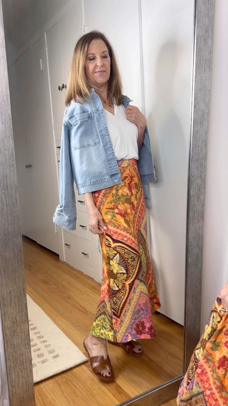 Behind the scenes! I look so serious! 😂  I always look for three ways to wear a fun item like this Farm Rio skirt. 
What do you think? 

This was a favorite skirt last month, so I wanted to share it again!!

Skirt, denim jacket, blazer, t-shirt, tank, button up, raffia bag, kitten heel and sandal. 


#LTKFindsUnder100 #LTKOver40 #LTKSeasonal
