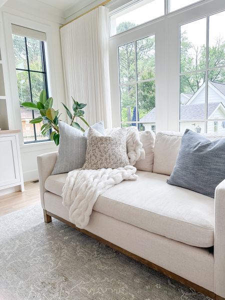 Ivory small sofa, coauch, loveseat, throw pillows, neutral home, white interior, living room design

#LTKstyletip #LTKsalealert #LTKhome