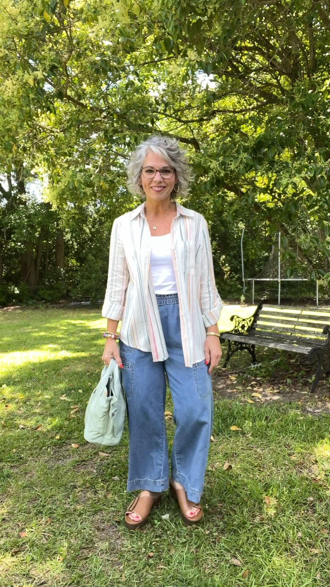 Full on boho vibes today you guys, a striped linen shirt worn open over a reversible double lined tank top, flowy wide leg chambray denim pants with an elastic smocked waist, brown wedge sandals, a mint green canvas boat bag that ties the whole look together, beaded bracelets, hoop earrings, a gold watch, and an initial necklace! The linen shirt pants and wedges are from Cato, the tank and gold jewelry are from Amazon, the beaded bracelets are from Walmart. 

#catofashion #catofinds #catostyle #amazonfashion #amazonfinds #amazonstyle #founditonamazon #walmartfashion #walmartfinds #summerstyle #summeroutfit #summerfashion #summerinspo #summervibes #summerlook #summerwear #springfashion #springoutfit #springstyle #casualoutfit #casualstyle #casualchic #effortlessstyle #effortlessfashion #bohostyle #bohofashion #bohooutfit #bohochic #bohovibes #bohosummer #flowyoutfit #ootd #ootdfashion #outfitoftheday #outfitinspo #outfitideas #realoutfitgram #todaysoutfit #affordablefashion #affordablestyle #budgetfashion #womensfashion #womensstyle #petitestyle #petitefashion #petiteoutfit #petitewomen #petitegirl #petites #momstyle #momfashion #momootd #momlife #teacherstyle #teacherfashion #grandmastyle #grandmafashion #over40style #over40fashion #over40andfabulous #fashionover40 #womenover40 #womenover40style #over50style #over50fashion #fashionover50 #agelessstyle #ageisjustanumber #midlife #midlifestyle #midlifefashion #maturestyle #maturefashion #fashionblogger #fashionista #styleinspo #fashioninspo #instafashion #cuteoutfit #trending #trendingnow #fashion #style #ltkfinds #ltkseasonal #ltkunder50 #ltkpetite #ltkover40 #ltkover50 #ltkfashion #ltkstyle #ltksummer #ltkspring #liketoknowit #shopltk #linenshirt #widelegpants #chambray #smockedwaist #wedgesandals #beadedbracelet #overshirt #linenoutfit #canvasbag #boatbag #mingreen #summerbag #totebag #bagsofinstagram #accessoriesoftheday

#LTKootd #LTKOver40 #LTKPetite