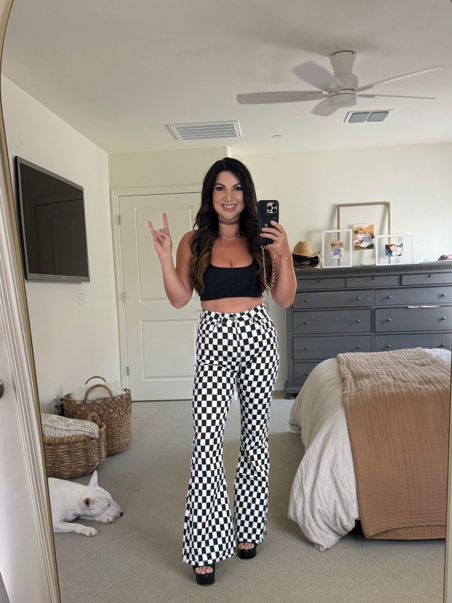 Checkerboard dreams and platform heels. 🖤🤍 These statement pants are stretchy, flattering, and guaranteed to turn heads. Perfect for concerts, festivals, girls’ nights, or anytime you want your outfit to do the talking.

#LTKStyle #LTKFashion #ConcertStyle #FestivalFashion #StatementPants #OOTD #FashionFinds #WeekendStyle #TrendyStyle #StyleInspo