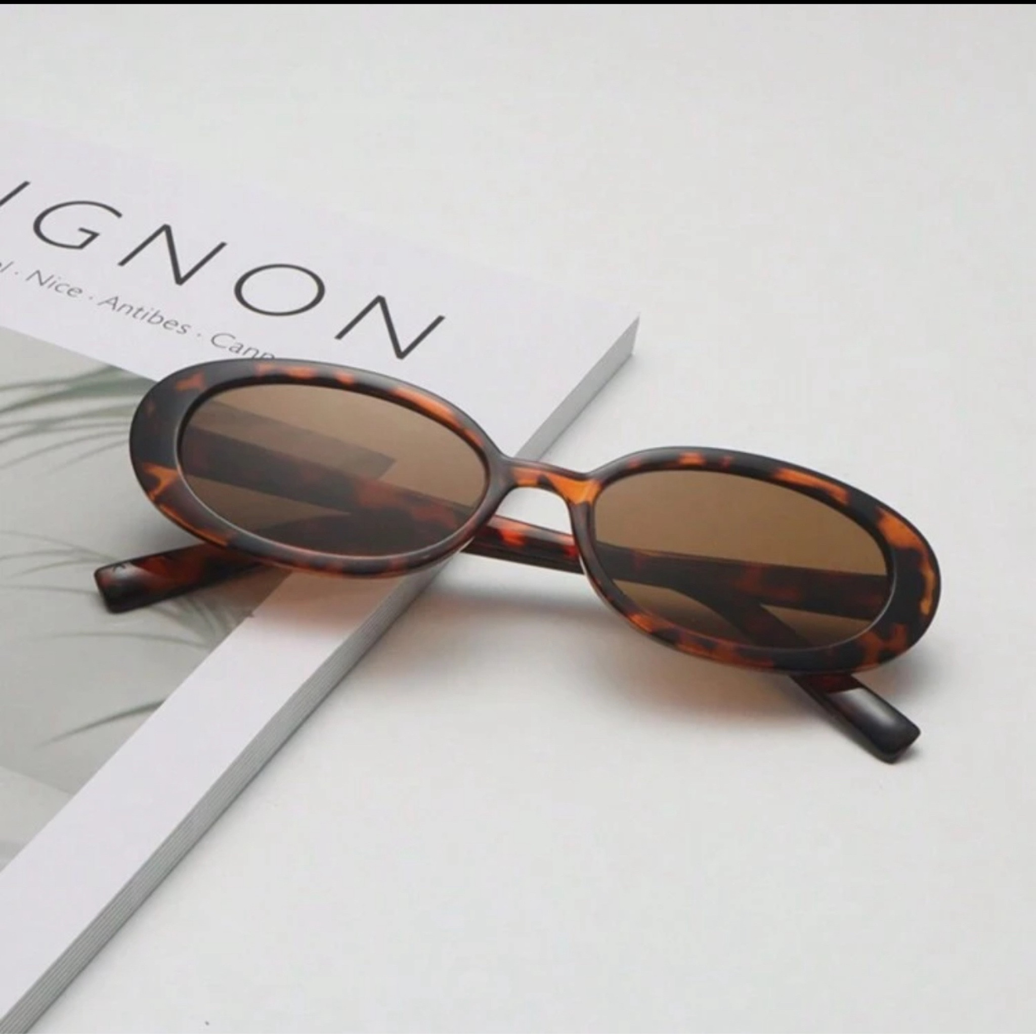 Brown Oval Sunglasses 

#LTKBeauty #LTKTravel #LTKSwim