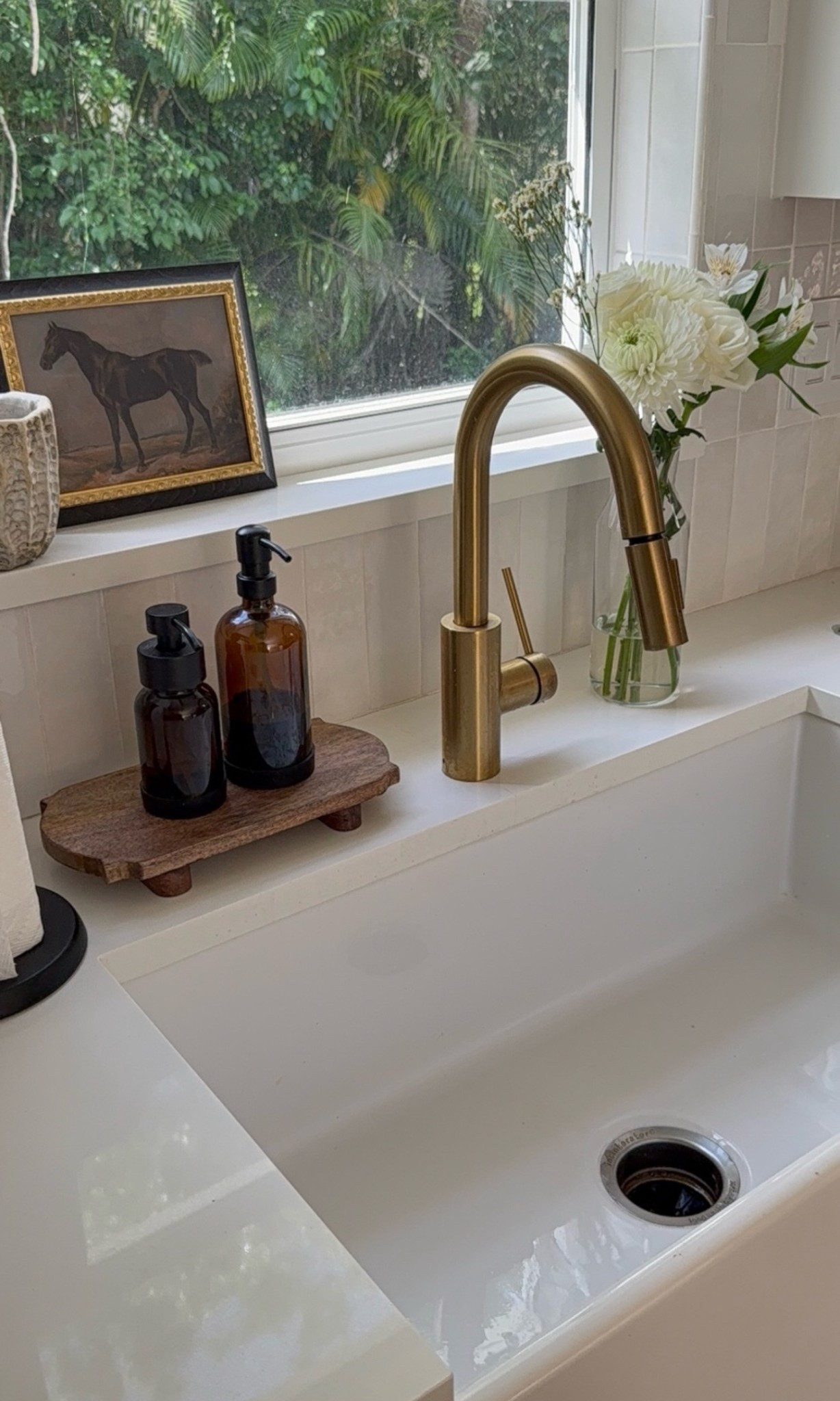 Little sink styling details that make doing dishes feel just a little more elevated. Amber glass soap dispensers, a wood riser, and fresh florals — it’s the simple things that make a space feel intentional. Everything linked on my LTK for an easy, pulled-together kitchen look.

#LTKfinds
#LTKhome
#LTKlinkinbio
#LTKunder100
#LTKsalealert
#LTKstyletip
#LTKshopping
#LTKcurated
#LTKtrending
#LTKhomefinds
#LTKlife
#FoundItOnLTK
#LTKdeal
#LTKmusthaves
#ShopMyHome
#AmazonFinds
#AmazonMustHaves
#ViralFinds
#TrendingNow
#InfluencerFinds

#LTKSaleAlert #LTKHome #LTKFamily