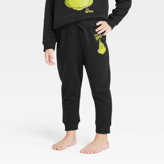 Toddler The Grinch Printed Jogger Pants - Black | Target