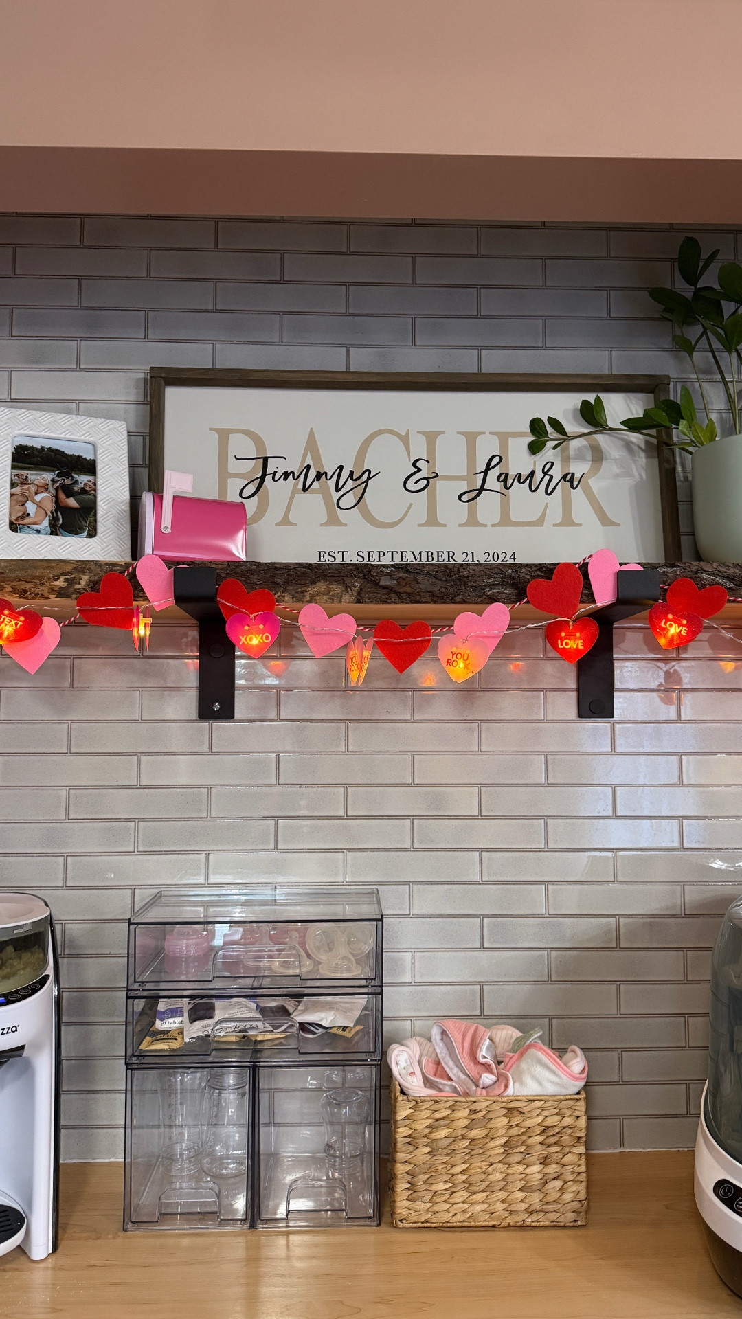 We’re ready for Valentine’s Day over here! 💌✨💓 Decorate our coffee bar turned bottle station with me. Walmart has such simple and affordable decor - shop quick before they run out. Linked a few things here so you can easily place a pickup order. My felt hearts are from the dollar section at Target a few years ago but I linked a cute option from Amazon. Happy shopping! 💜 
#valentinesday #valentinesdecor 

#LTKValentine #LTKmomlife #LTKHome
