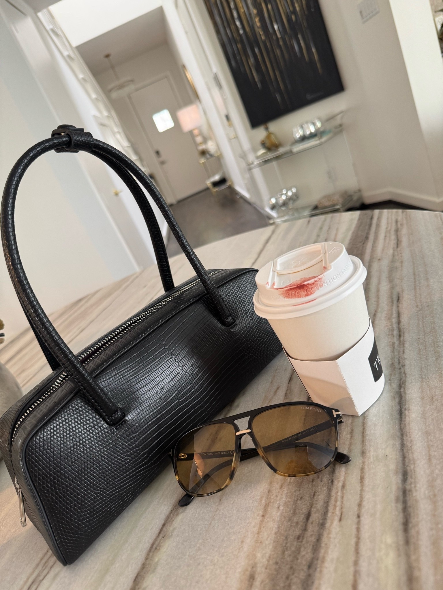 Meet the chicest black handbag I’ve seen in a long time. 🖤

I’m obsessed with this lizard-embossed vegan leather bag from Freja. It has that elevated, designer-inspired look that instantly makes any outfit feel more polished, but at a fraction of the price.

The structured silhouette, rich texture, and timeless black color make it a bag you’ll reach for over and over again. Whether you’re wearing jeans and a tee or a sleek all-black look, this bag adds the perfect sophisticated finishing touch.

If you’re looking for a beautiful, modern handbag that looks far more expensive than it is, I highly recommend this one

#LTKOver40 #LTKootd #LTKdayinmylife